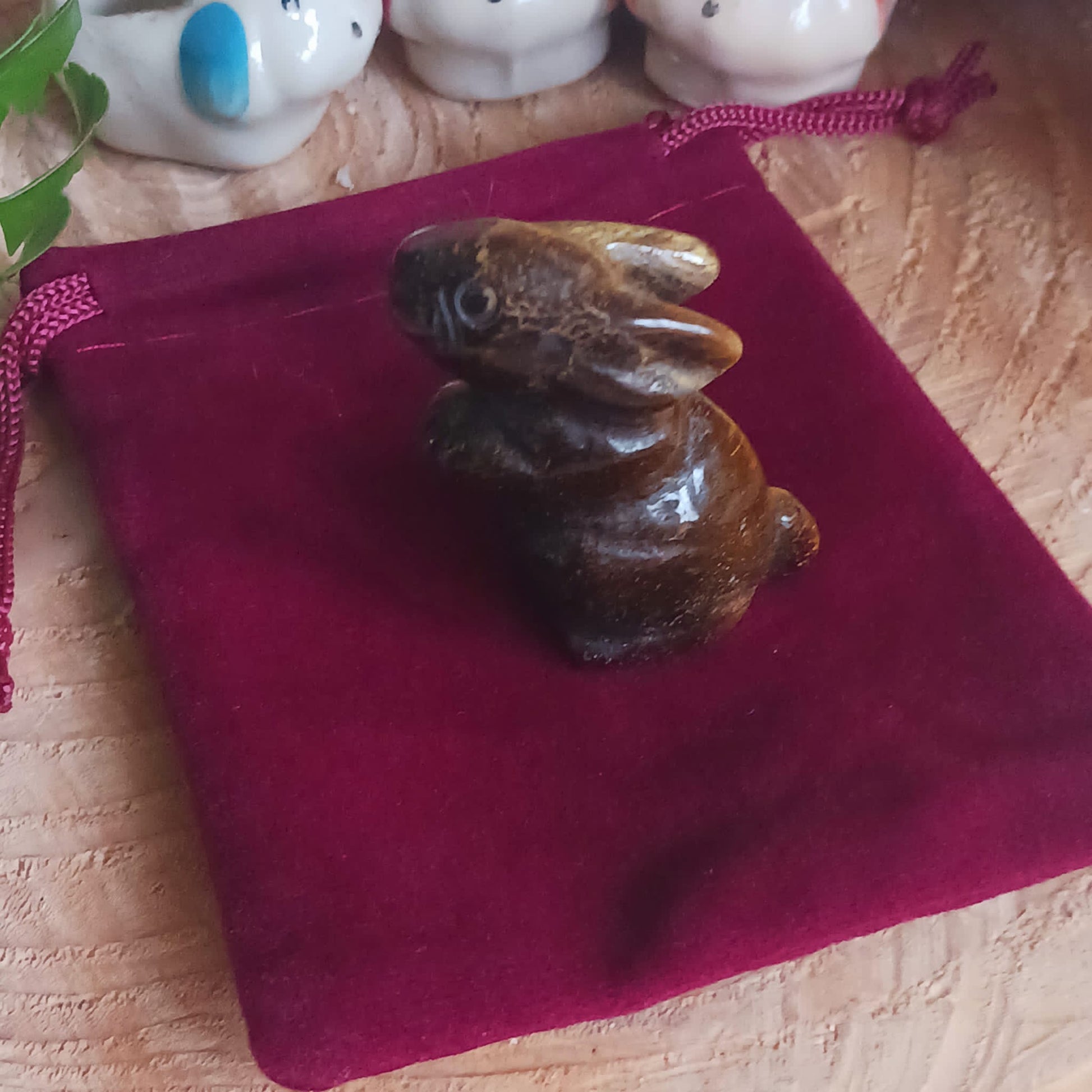 This cute little golden Tigers Eye rabbit has been hard carved from the stone with unique markings reminiscent of rich gold brown fur. As these are hand carved, each bunny is unique and individual.