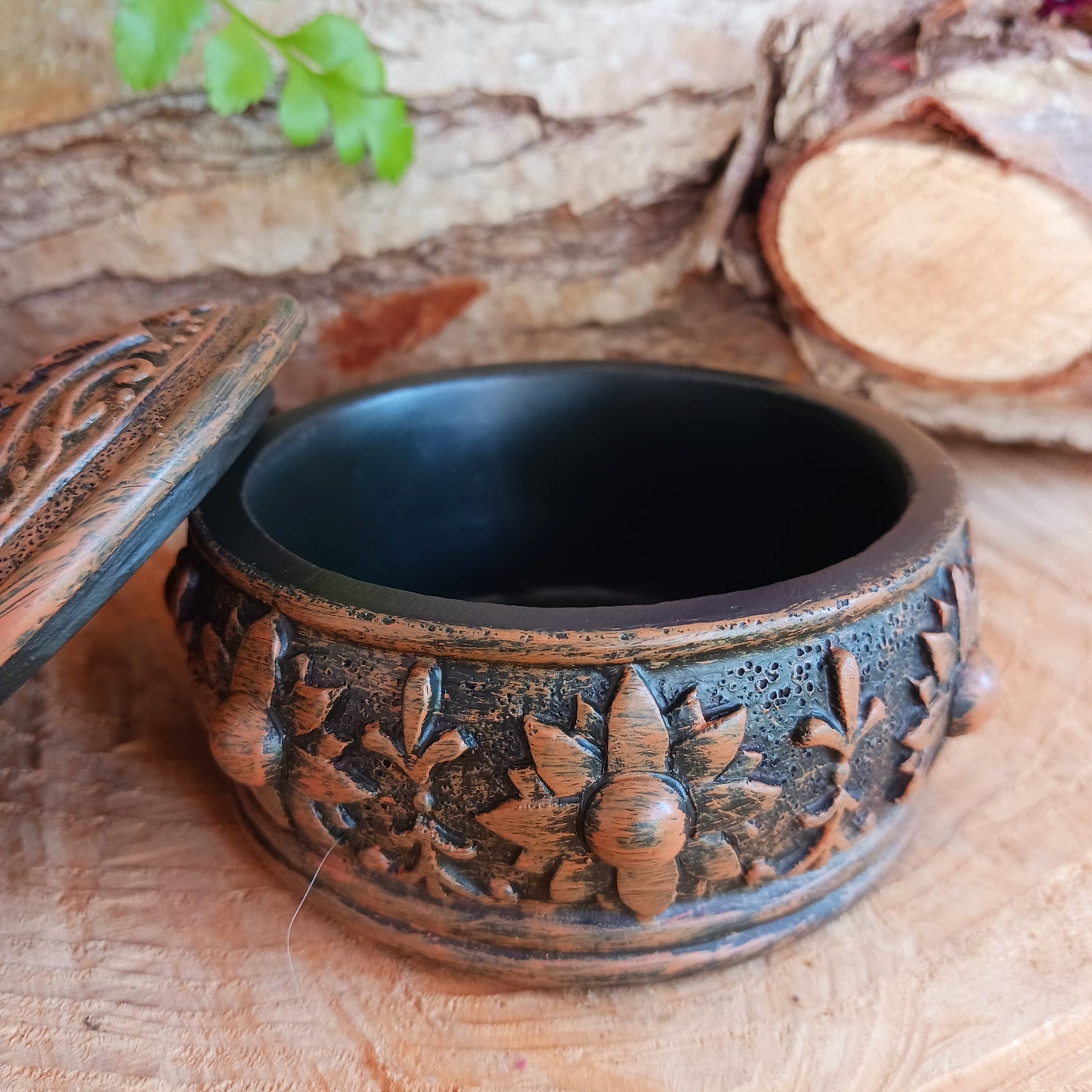 This beautiful Charka Box features Hamsa's Hand which is known for offering protection and happiness to its owners, you can rest assured that your most prized possessions are safe from prying eyes. With engraved flowers and patterns around the side of the box, and finished with coloured gemstones on the top of the lid. This piece is perfect for anyone who needs a little protection in their life.