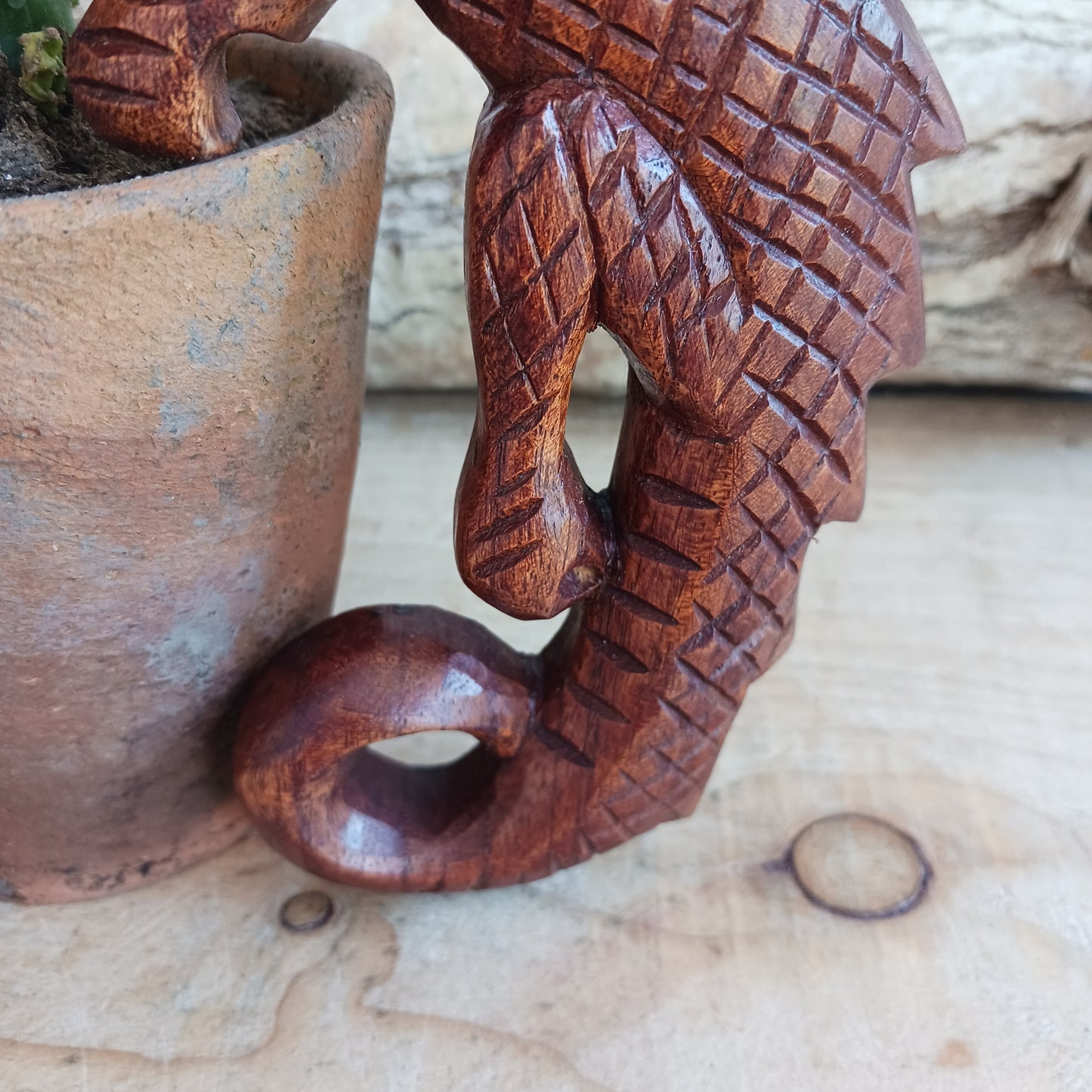 This intricately carved Dragon plaque sit flush against the wall or can be hooked onto pots or some other items in the home. These Dragons are hand carved with metal hook for hanging if you choose. In early cultures, the dragons were often seen as mighty serpents and beasts that were either extremely benevolent or fearsome and difficult to kill. The beliefs of a region are often influenced by geographical location. Eastern cultures often saw dragons as a knowledgeable deity that had power over storms