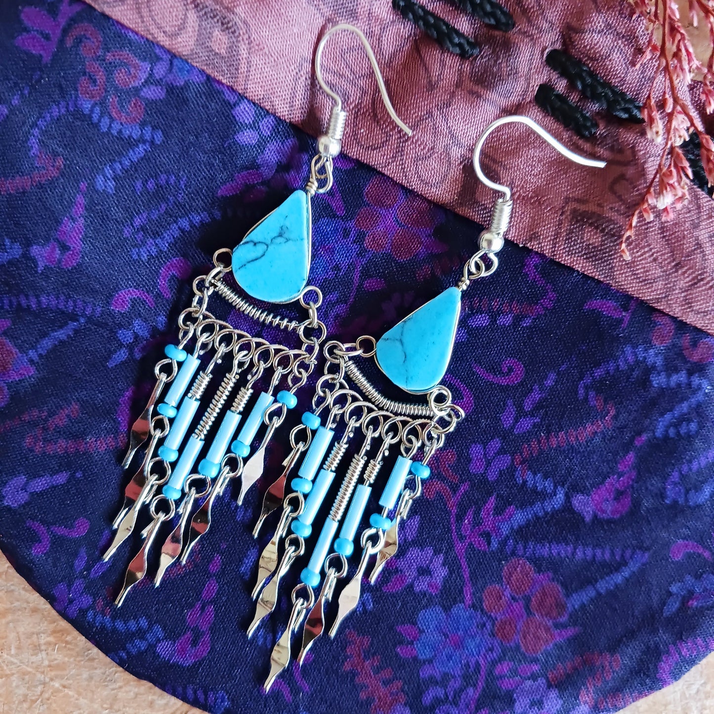 These beautiful hoop earrings incorporate Peruvian Turquoise Stone with Silver plated hooks. They have been hand made in Peru and are presented in a traditionally made pouch, gift wrapped and ready to giveāø