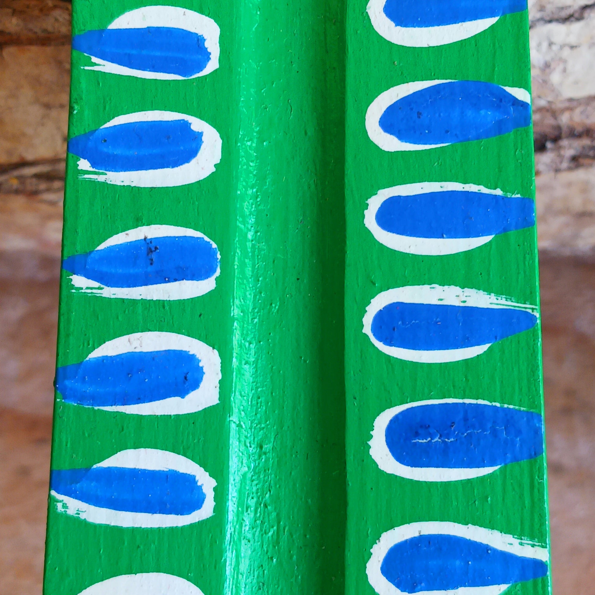 A classic shaped incense holder handmade from sustainable mango wood and hand painted in colourful Indian Truck Art designs.  It has a single end incense stick holder at one end.  A lovely ornamental piece of Indian décor and a nice gift item.