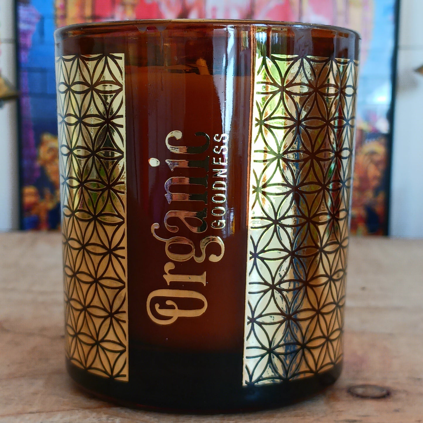 Song of India Organic Goodness soy wax candle, infused with natural smudge herbs and essential oils. The refreshing scent of lemongrass is combined with warm spices such as cloves, star anise and cinnamon. Hand poured in a decorative glass jar with flower of life pattern.