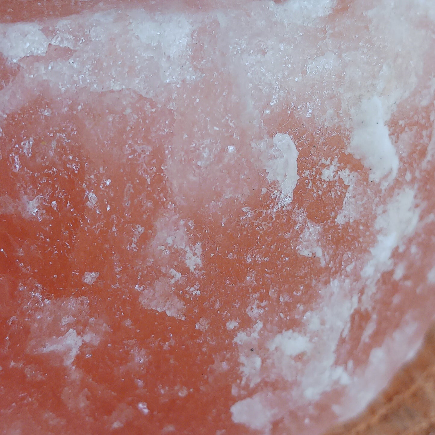 The tealight holders are made from chunks of Himalayan pink salt, which has a natural pink-red hue because of the minerals from which it’s formed. This gives off a soft, soothing pink glow when a tealight is shone through the rock.
