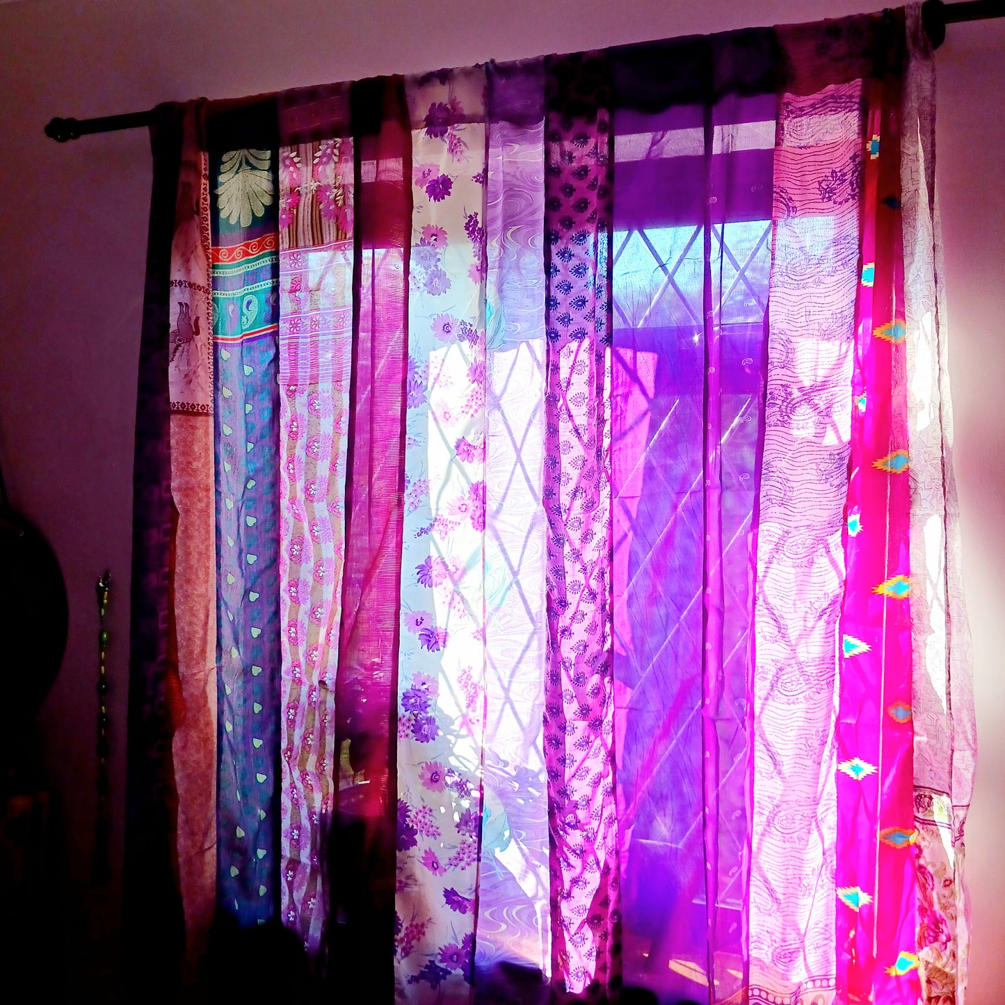 These beautiful curtains are handmade from assorted panels of Indian sari fabric, hand crafted into beautiful recycled curtain panels. The combined varieties of silky soft material are made with an easy to mount top hanging rod pocket.