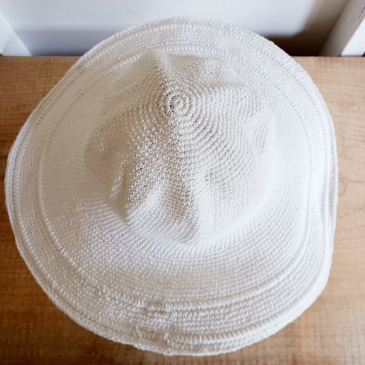 This lovely white crochet sun hat is handmade and Fairtrade from Indonesia. Each hat has a malleable wire woven into the rim to help keep the shape. The hat is wide brimmed and provides protection from the sun, so perfect for any summer outdoor activity.