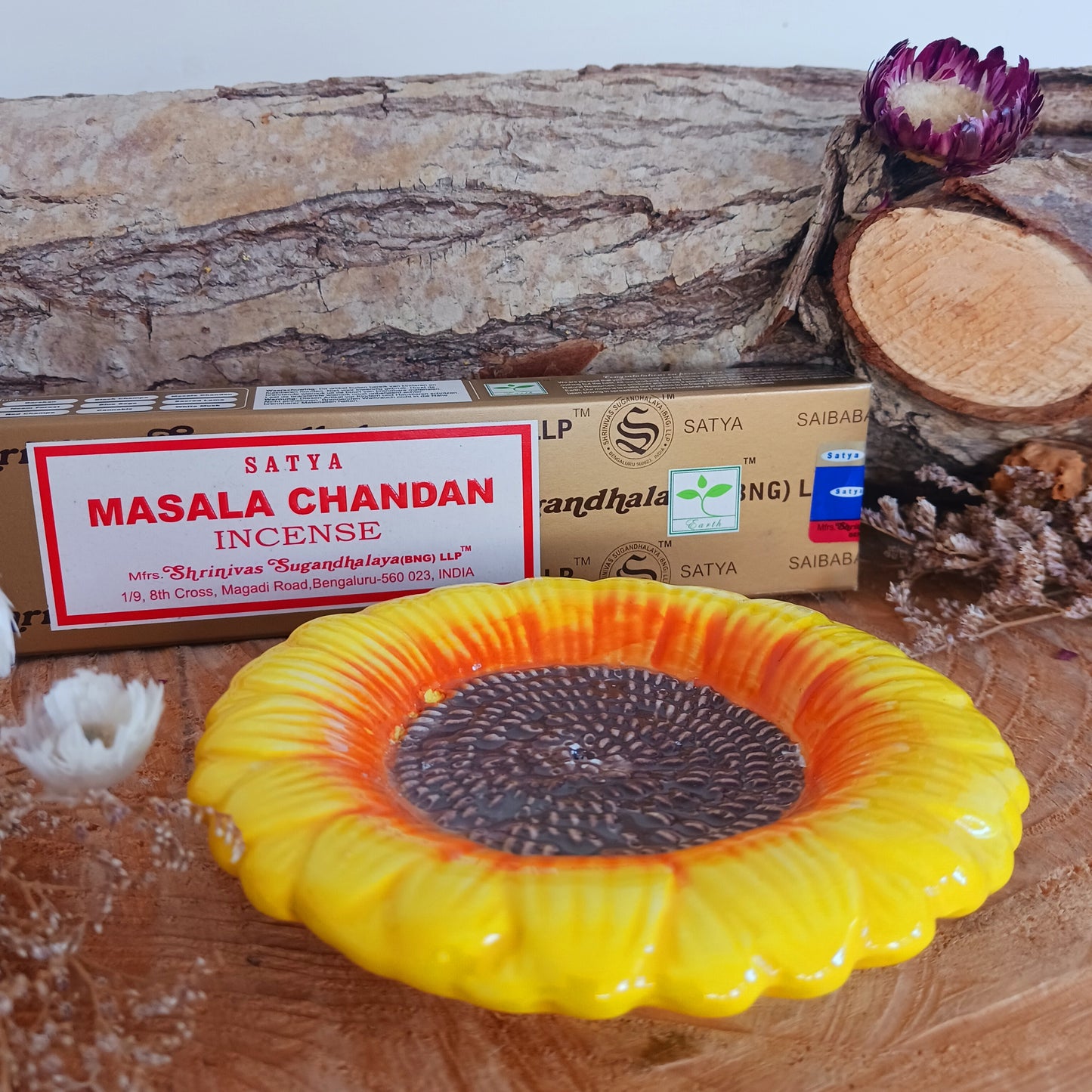 Refresh your senses with this pretty ceramic incense holder shaped like a classic sunflower. Bright and cheerful, this ceramic holder will look charming on a side table or nightstand while catching falling ash.