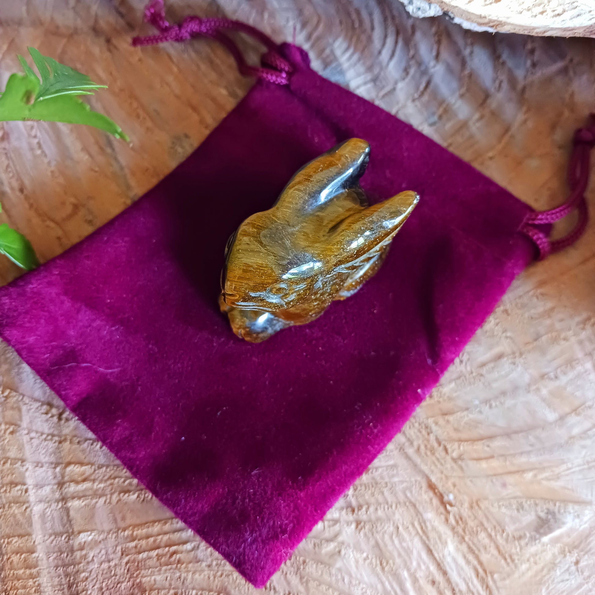 This cute little golden Tigers Eye rabbit has been hard carved from the stone with unique markings reminiscent of rich gold brown fur. As these are hand carved, each bunny is unique and individual.
