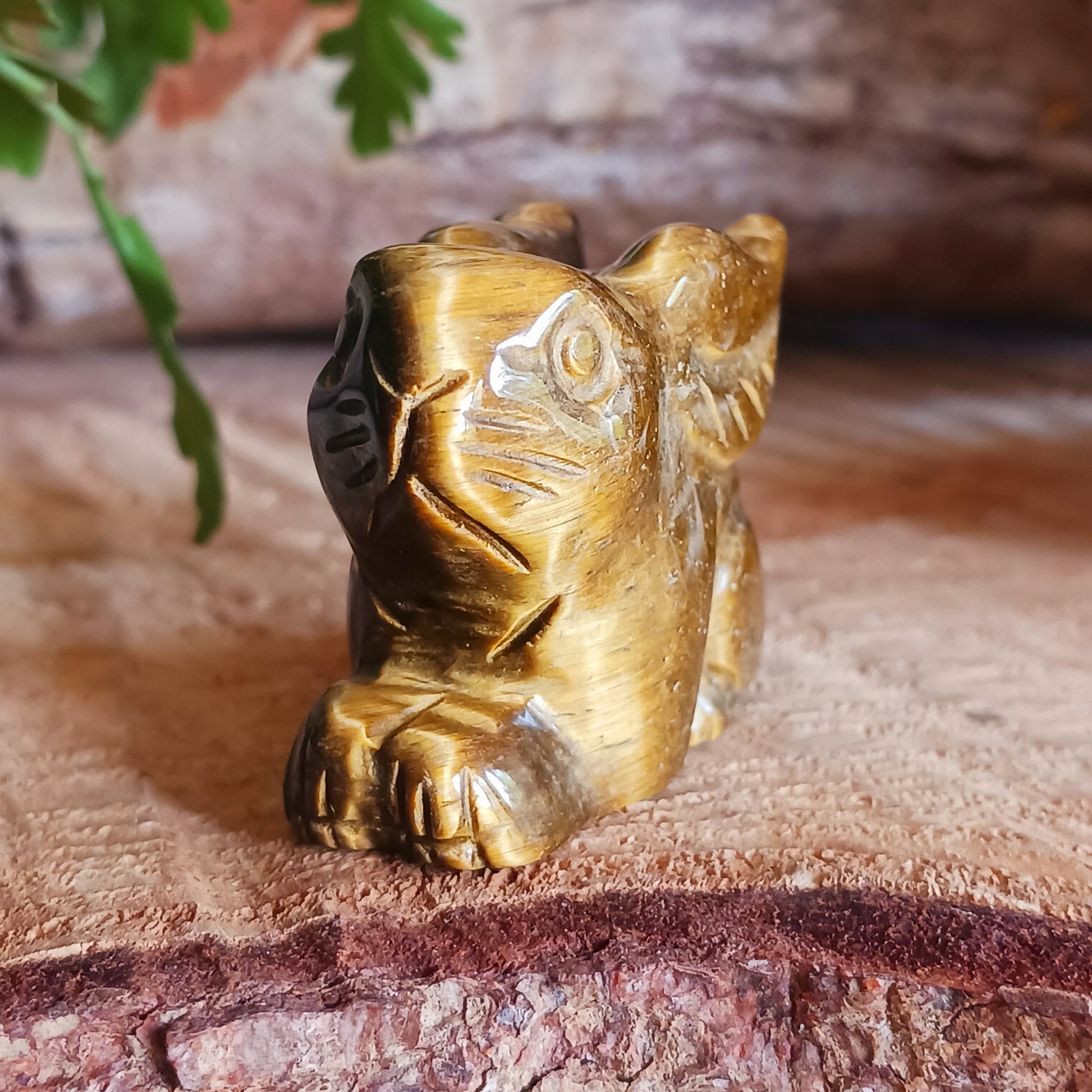 This cute little golden Tigers Eye rabbit has been hard carved from the stone with unique markings reminiscent of rich gold brown fur. As these are hand carved, each bunny is unique and individual.