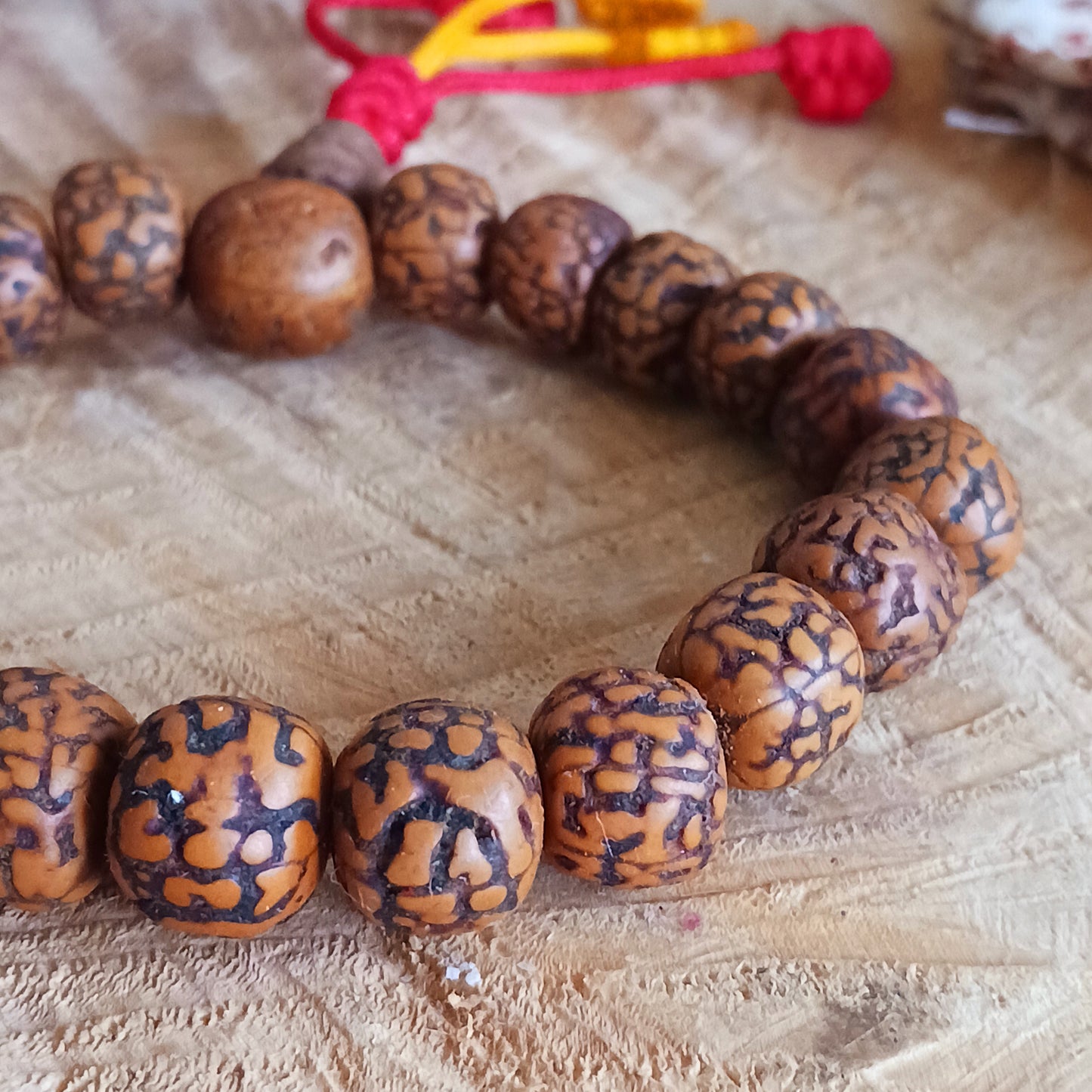 These wrist mallahs are known as Rudraksha in India and Nepal and are traditionally worn by people such as Hindu ascetics or sadhus. This is because they are believed to protect against negative energies and to aid people who spend a lot of time travelling around.