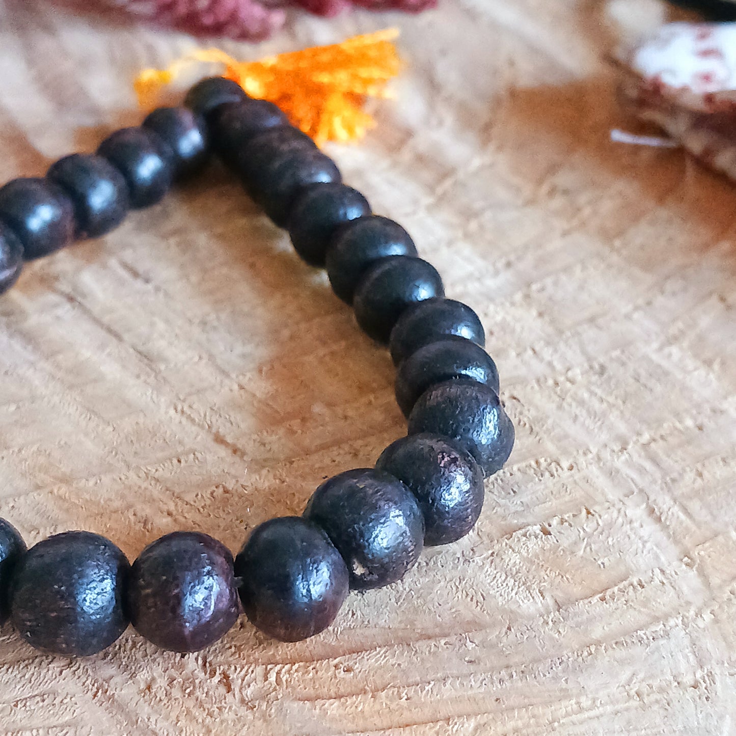 This set of mallah beads has been strung on an elasticated cord, perfect for wearing on the wrist. Each mallah comes in its own little recycled Tibetan pouch with a lokta paper info card making it an attractive gift.