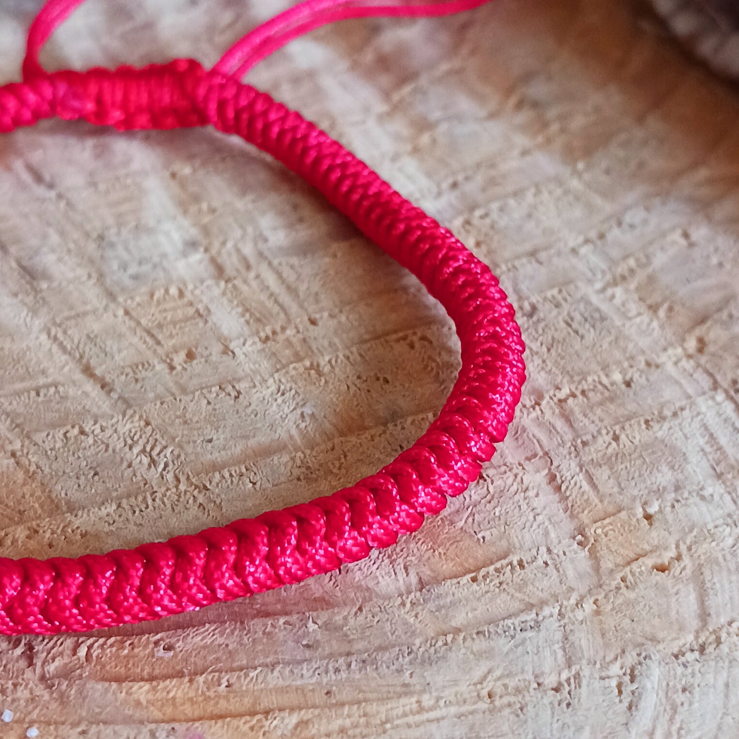 This red Tibetan handmade knot rope bracelet is made with good quality braided cord, durable and last long time, super light, safe and comfortable to wear. One size but adjustable size make it suit anyone to wear.