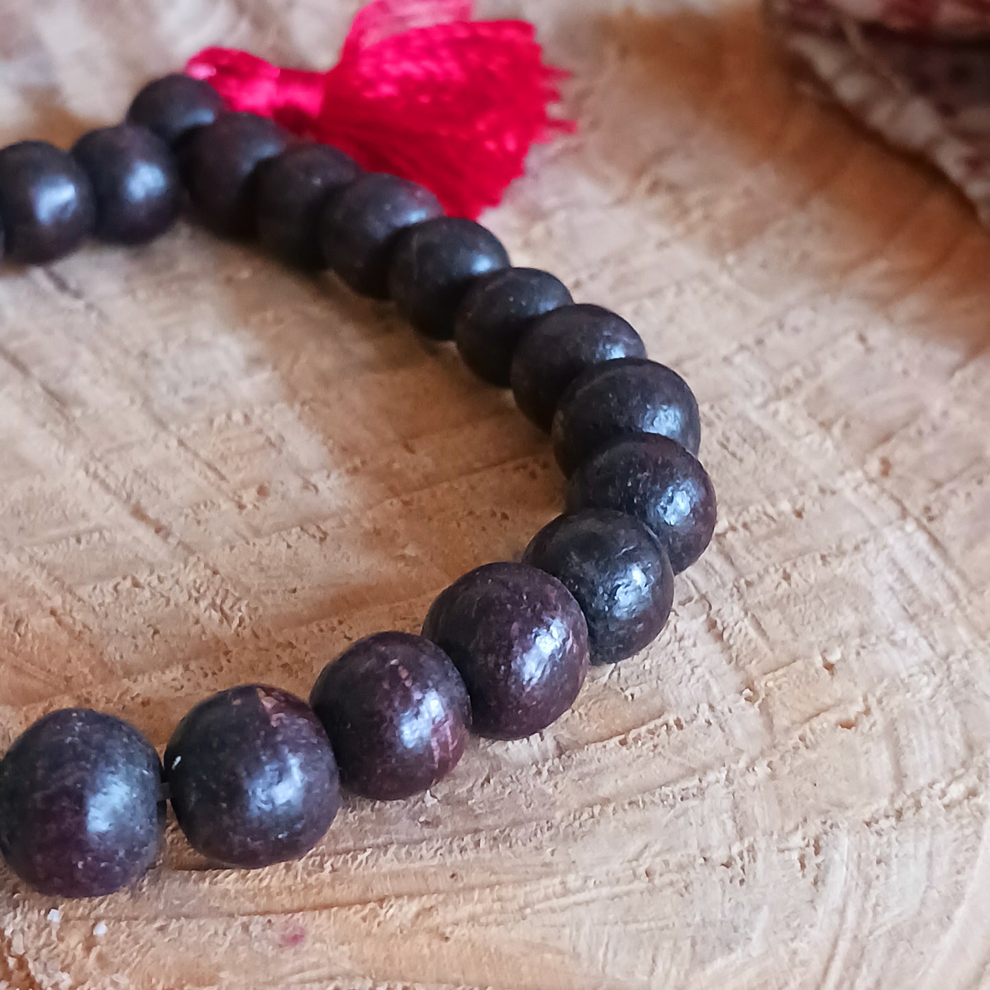 This set of mallah beads has been strung on an elasticated cord, perfect for wearing on the wrist. Each mallah comes in its own little recycled Tibetan pouch with a lokta paper info card making it an attractive gift.