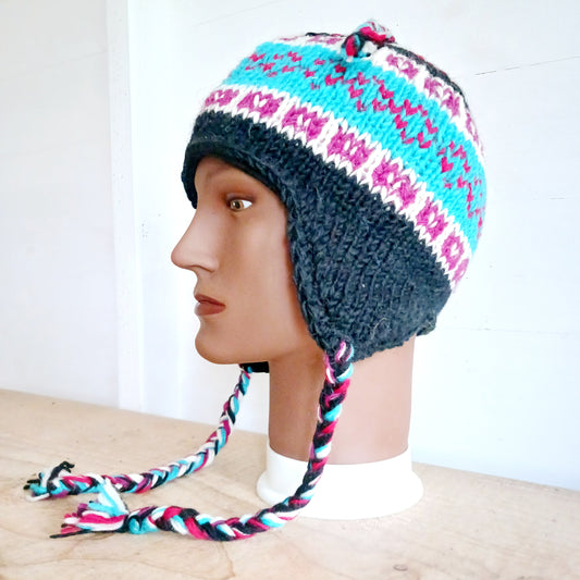 Chunky wool earflap hats hand made in Nepal with fleece lining for extra warmth and comfort, this handmade hat is awesomely warm.