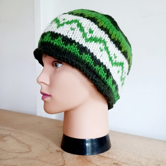 Chunky wool beanie hats hand made in Nepal with fleece lining for extra warmth and comfort, this handmade hat is awesomely warm. These knitted beanie hats have a rolled brim, a warm lined interior and are available in mixed colours.
