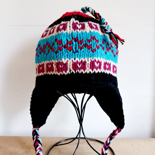 Chunky wool earflap hats hand made in Nepal with fleece lining for extra warmth and comfort, this handmade hat is awesomely warm.