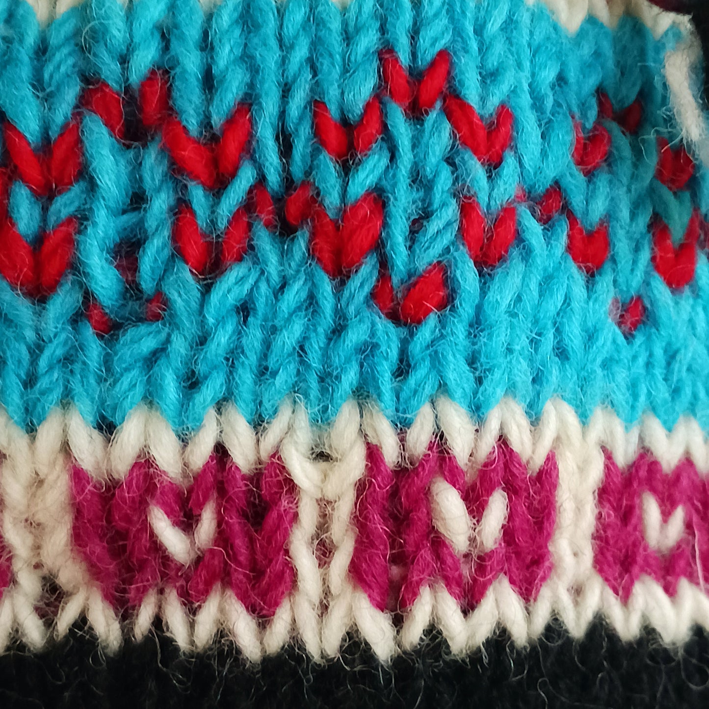Chunky wool earflap hats hand made in Nepal with fleece lining for extra warmth and comfort, this handmade hat is awesomely warm.