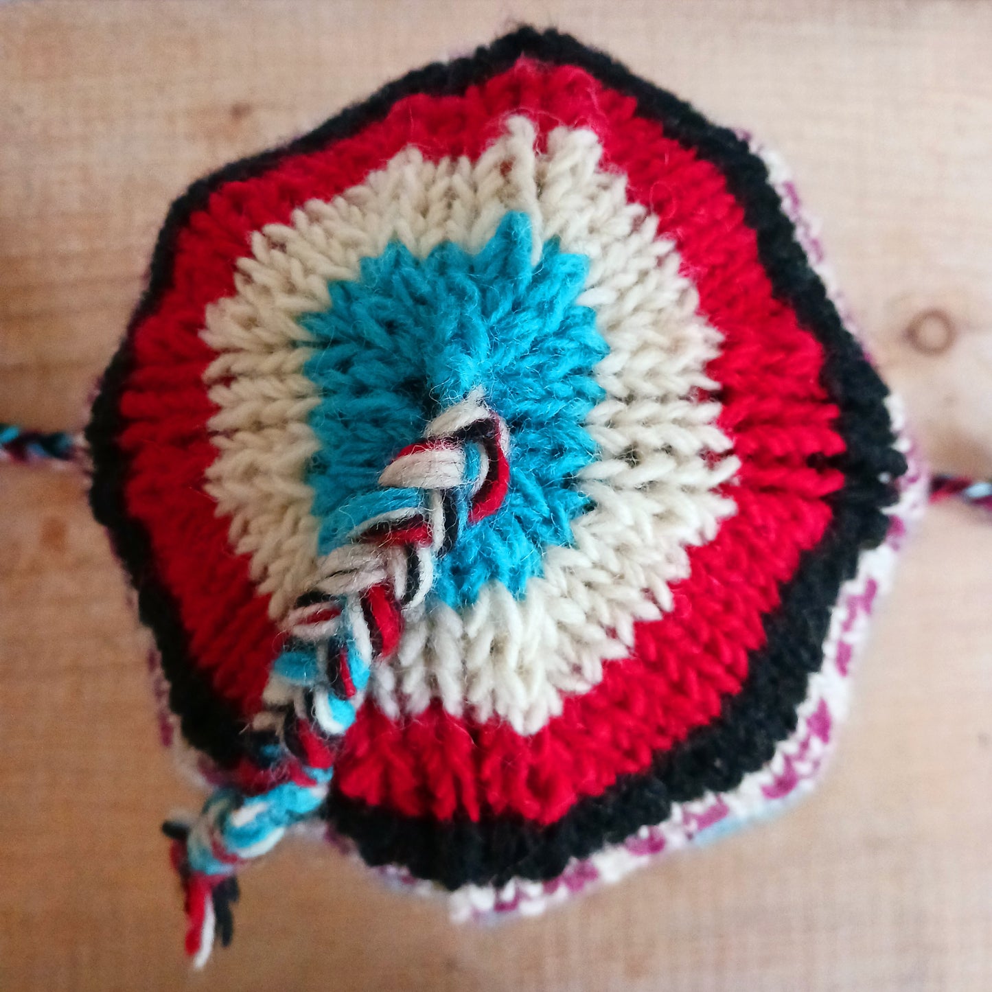 Chunky wool earflap hats hand made in Nepal with fleece lining for extra warmth and comfort, this handmade hat is awesomely warm.