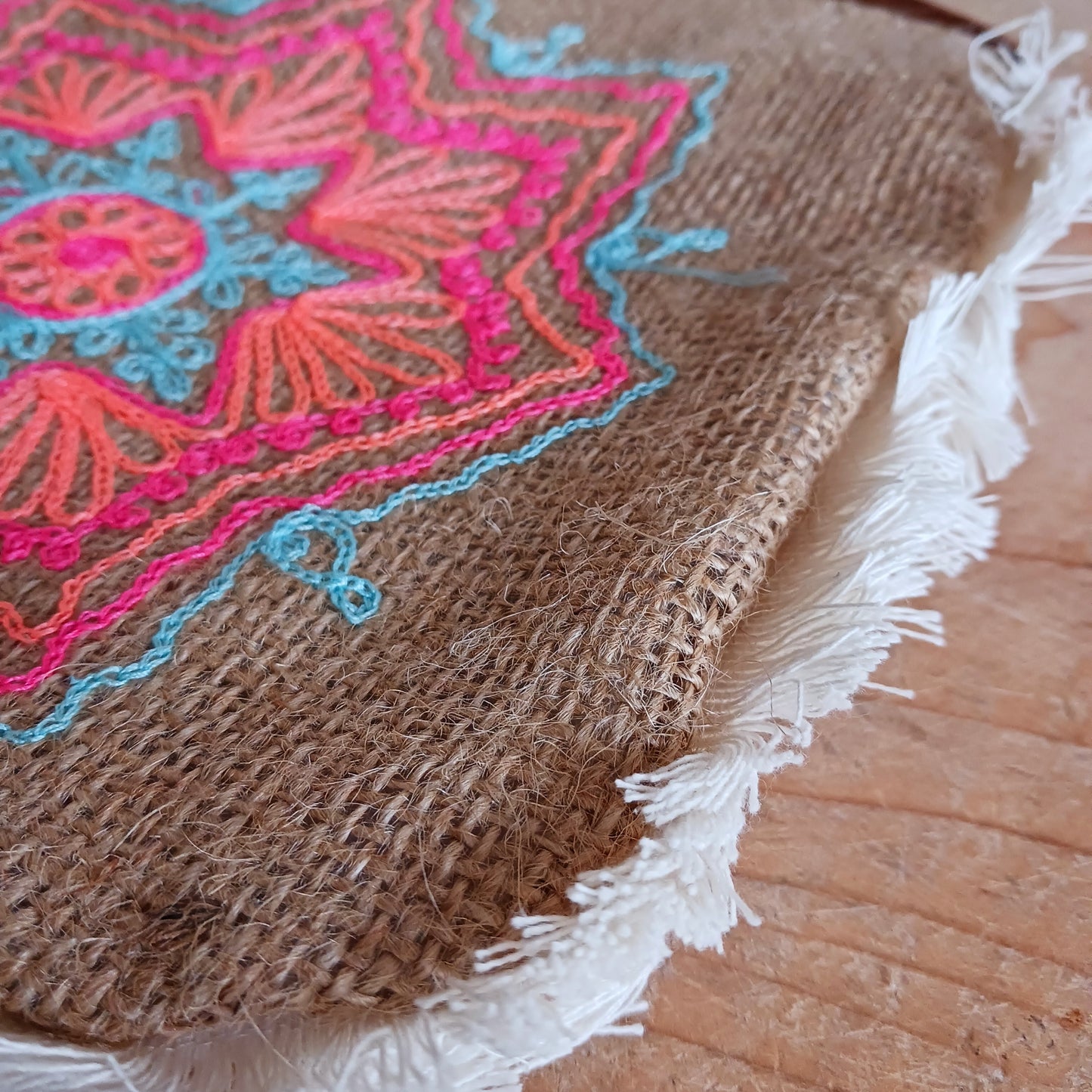 These unique and lovely bags have mandala patterns on smooth jute that has been washed with fashionable prints that are either printed or sewn onto it, and finished with a fringe. Handmade by a Balinese family business, these bags are carefully sewn by hand with intricate details.