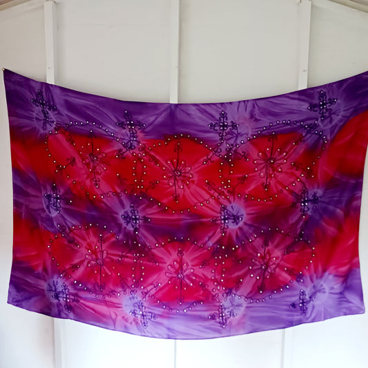 Beautifully dazzling cosmic sarongs combine the multiple colours of tie-dye, decorative embroidery and shimmering sequins all in one sarong. Each sarong has a little extra width, and finished edges (no fringe).