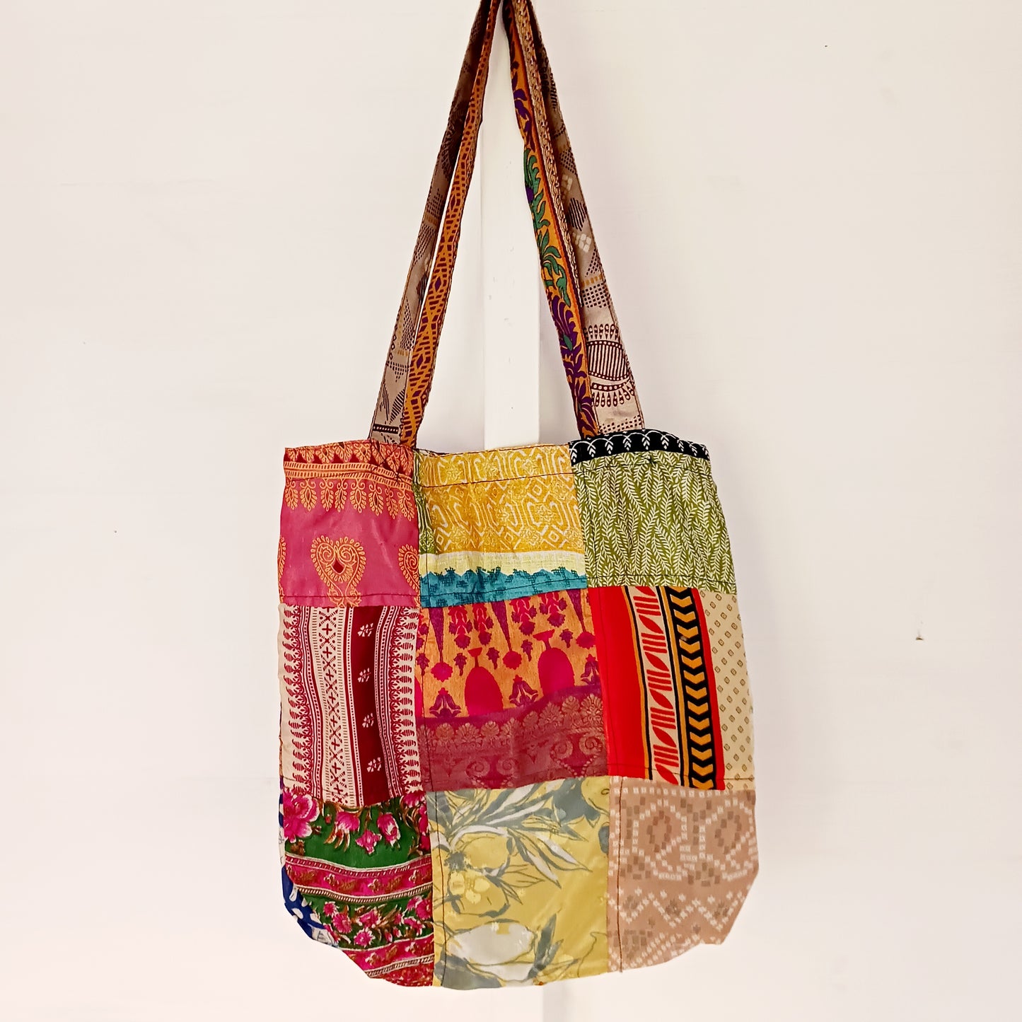 These unique and beautifully made tote bags are perfect to pack on any occasion. They're strong yet lightweight, handmade from colourful sari fabric with a polyester lining.
