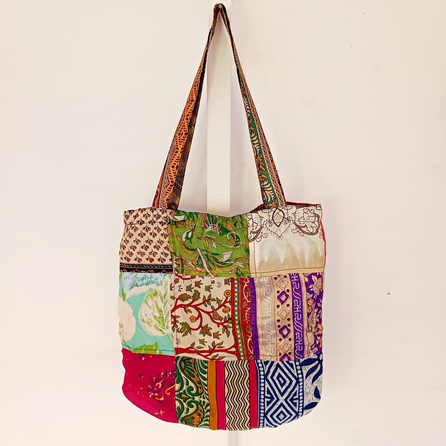 These unique and beautifully made tote bags are perfect to pack on any occasion. They're strong yet lightweight, handmade from colourful sari fabric with a polyester lining.