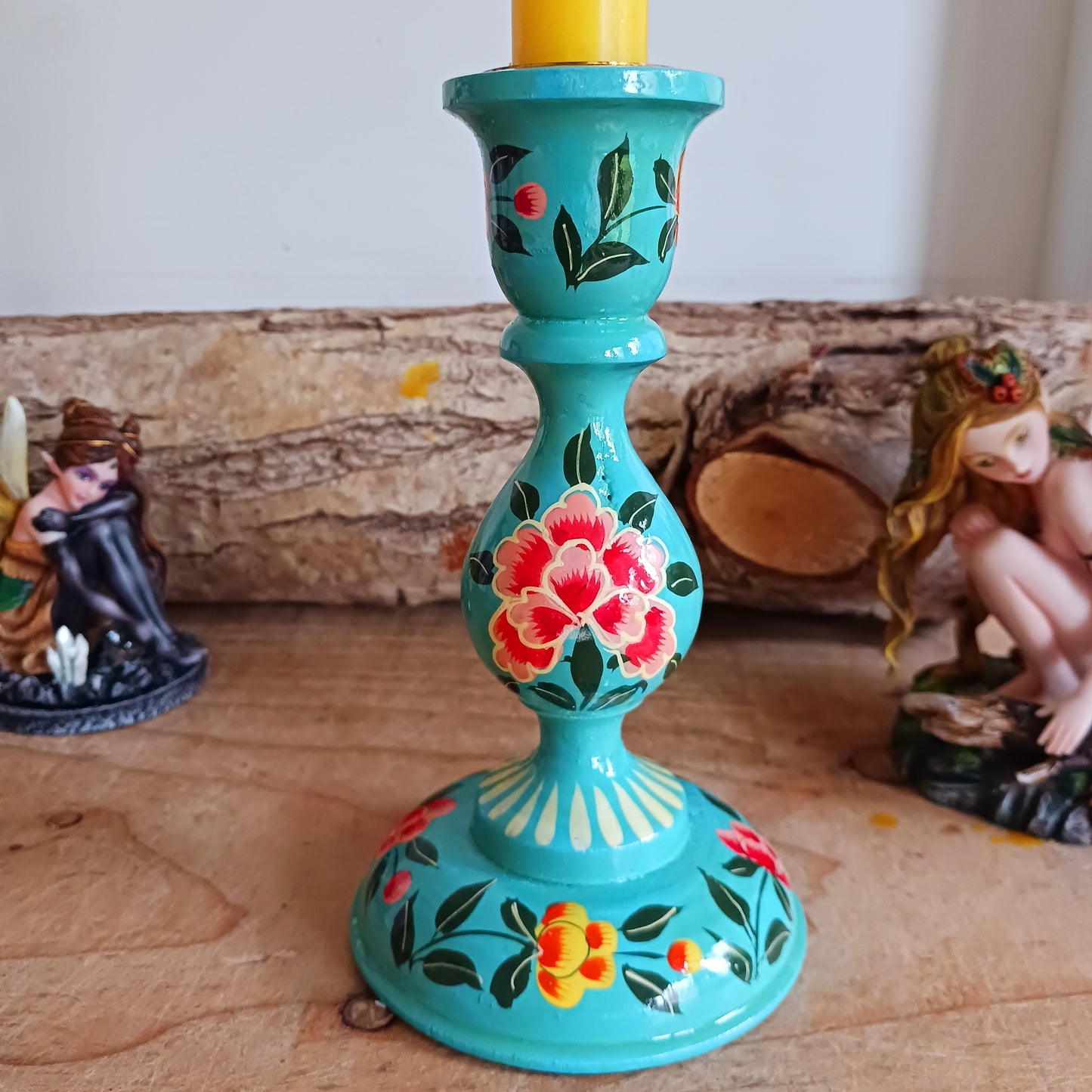 These beautifully hand crafted Kashmiri candle holders have been hand painted in vibrant, decorative colours of pink, yellow and turquoise. These unique candlesticks will fill any space with elegant grandeur. Intricate flower petals and delicate foliage are finished to a high shine glaze to boost the intensity of a captivating design.