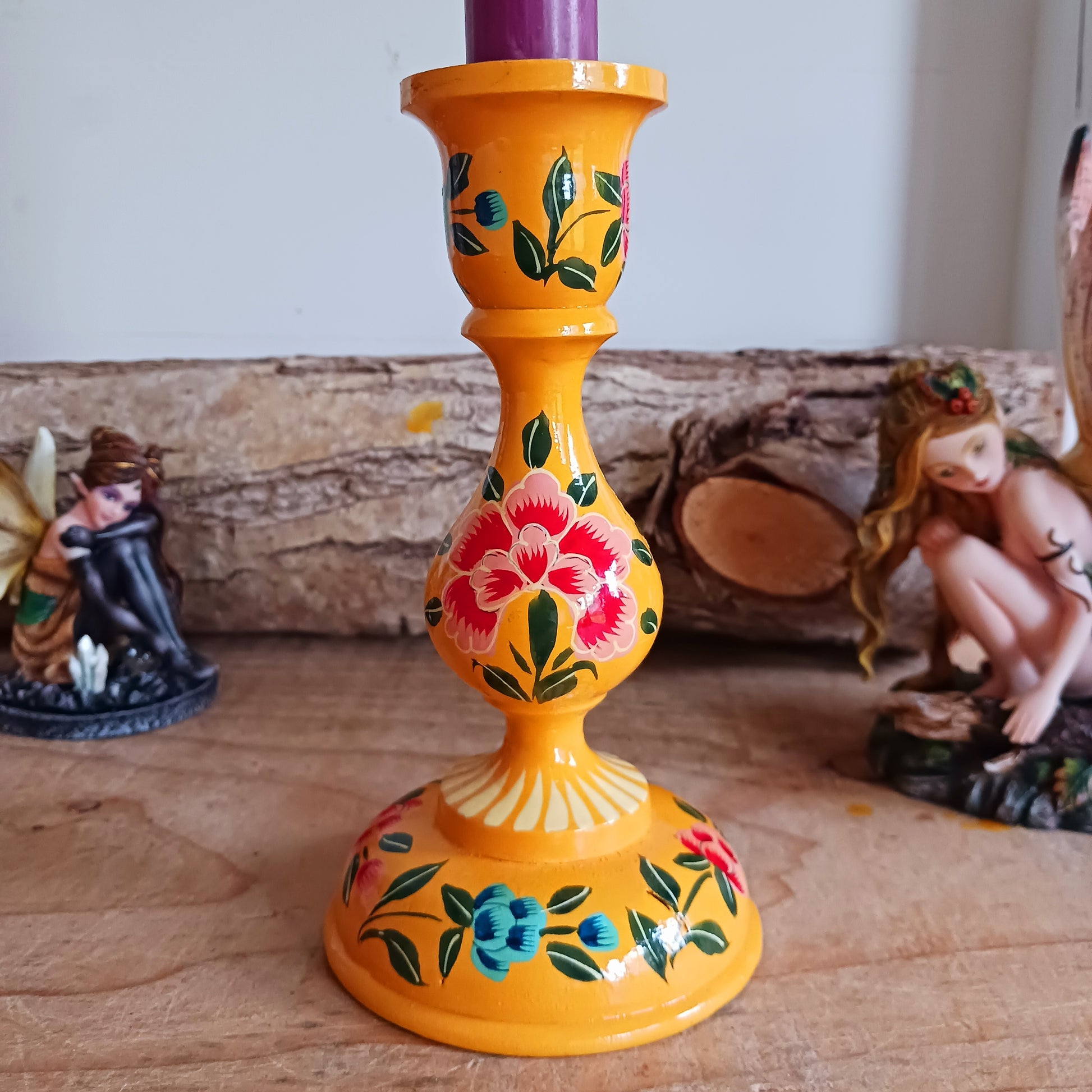 These beautifully hand crafted Kashmiri candle holders have been hand painted in vibrant, decorative colours of pink, yellow and turquoise. These unique candlesticks will fill any space with elegant grandeur. Intricate flower petals and delicate foliage are finished to a high shine glaze to boost the intensity of a captivating design.