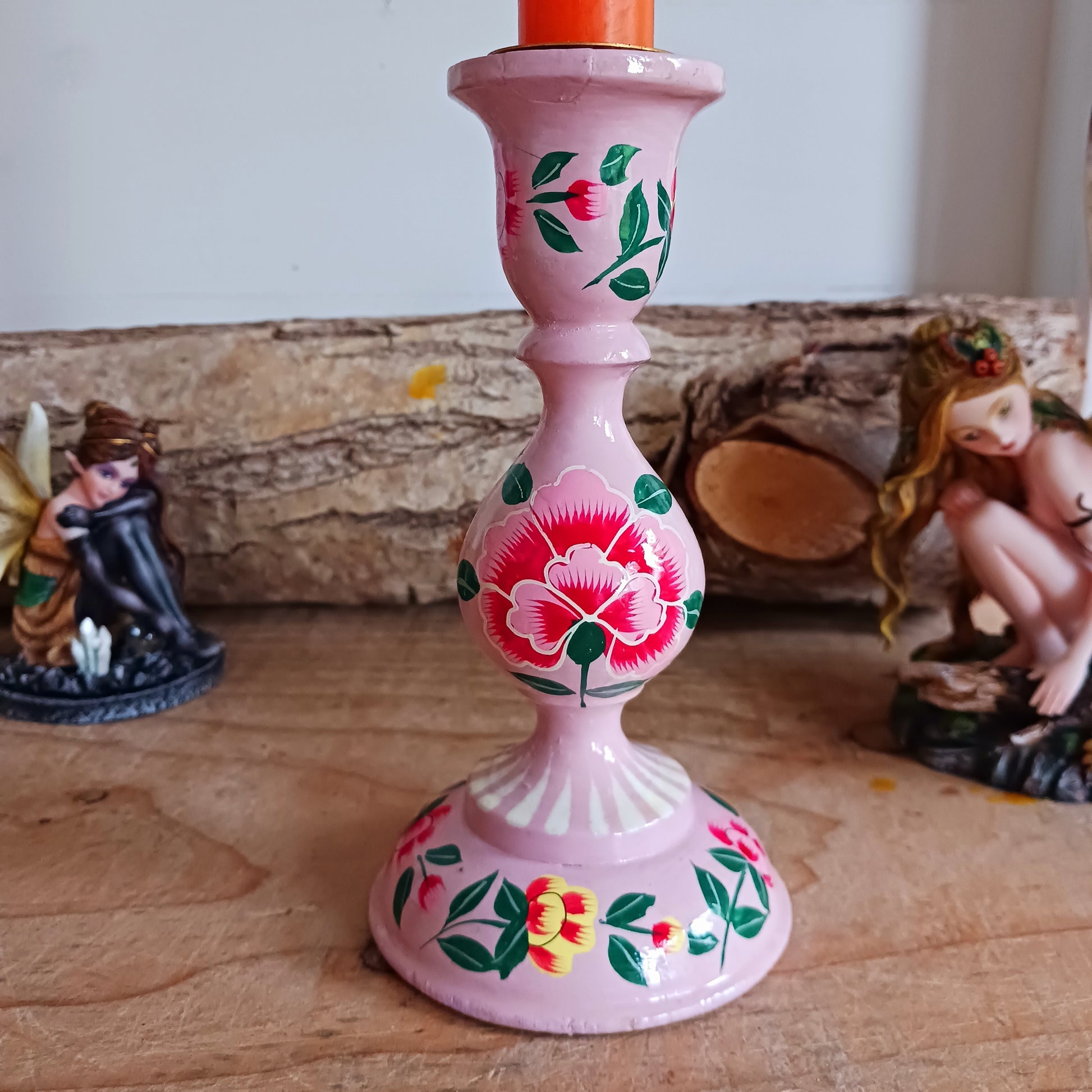 These beautifully hand crafted Kashmiri candle holders have been hand painted in vibrant, decorative colours of pink, yellow and turquoise. These unique candlesticks will fill any space with elegant grandeur. Intricate flower petals and delicate foliage are finished to a high shine glaze to boost the intensity of a captivating design.