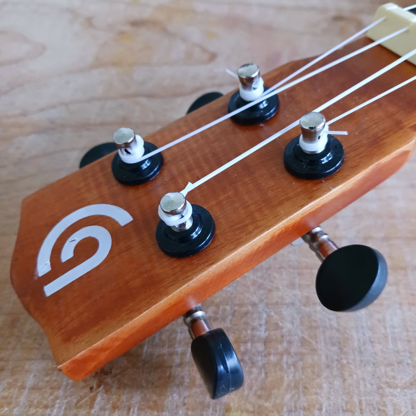These handmade Artisan Ukuleles are beautifully handcrafted instruments from Indonesia. Featuring a natural sunburst finish, these 4-string ukuleles combine exceptional quality with vibrant visual appeal. Their high-quality construction ensures warm, resonant tones that are perfect for a variety of musical styles.