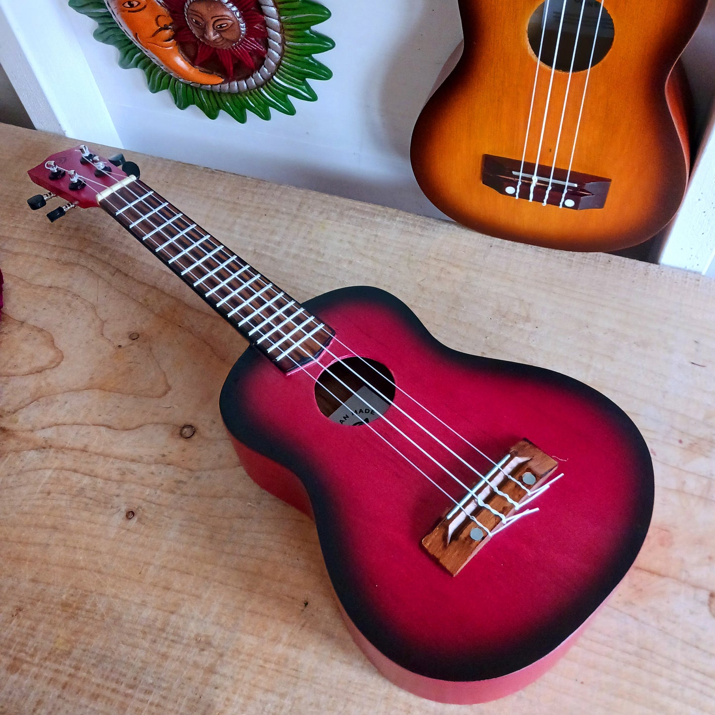 These handmade Artisan Ukuleles are beautifully handcrafted instruments from Indonesia. Featuring a natural sunburst finish, these 4-string ukuleles combine exceptional quality with vibrant visual appeal. Their high-quality construction ensures warm, resonant tones that are perfect for a variety of musical styles.