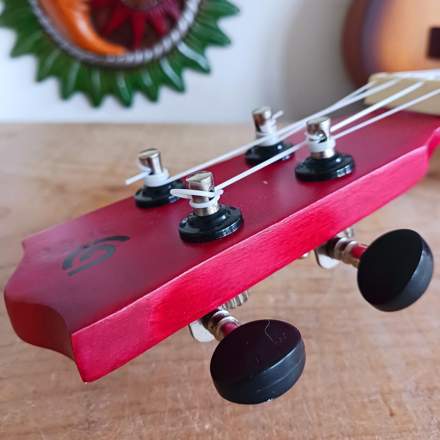 These handmade Artisan Ukuleles are beautifully handcrafted instruments from Indonesia. Featuring a natural sunburst finish, these 4-string ukuleles combine exceptional quality with vibrant visual appeal. Their high-quality construction ensures warm, resonant tones that are perfect for a variety of musical styles.
