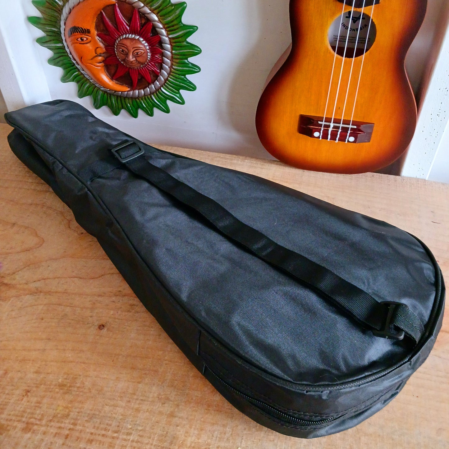 These handmade Artisan Ukuleles are beautifully handcrafted instruments from Indonesia. Featuring a natural sunburst finish, these 4-string ukuleles combine exceptional quality with vibrant visual appeal. Their high-quality construction ensures warm, resonant tones that are perfect for a variety of musical styles.