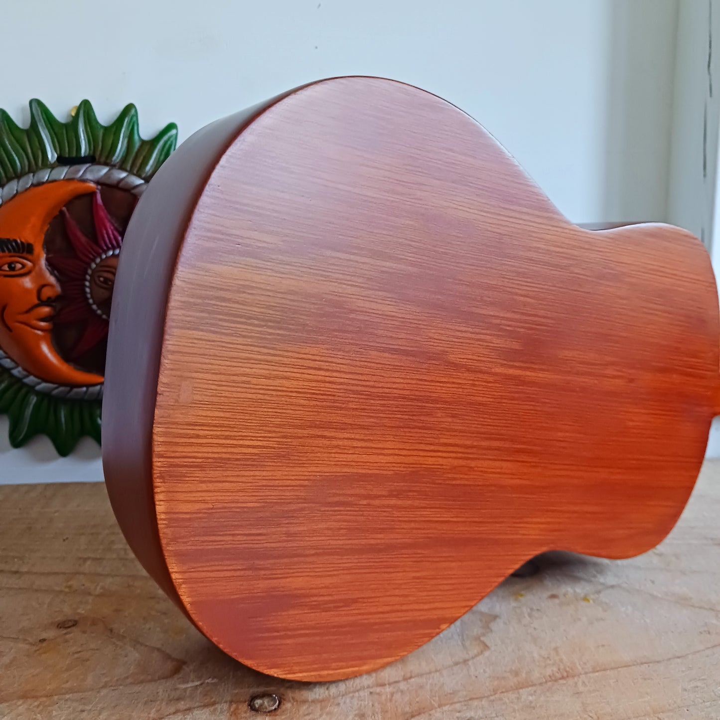 These handmade Artisan Ukuleles are beautifully handcrafted instruments from Indonesia. Featuring a natural sunburst finish, these 4-string ukuleles combine exceptional quality with vibrant visual appeal. Their high-quality construction ensures warm, resonant tones that are perfect for a variety of musical styles.