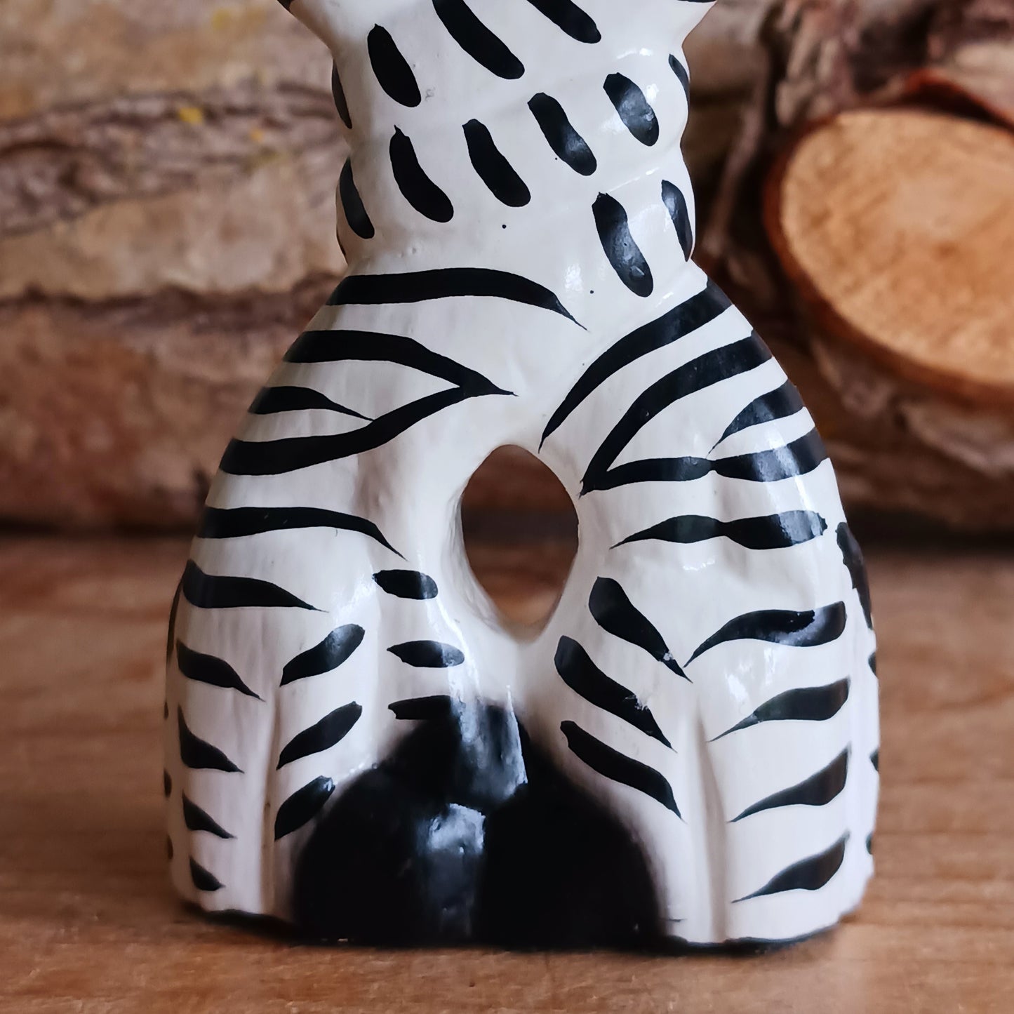 These cartoon kissing zebras make a fun, cute couple! They are handcarved and painted and make a great little gift for animal fans.