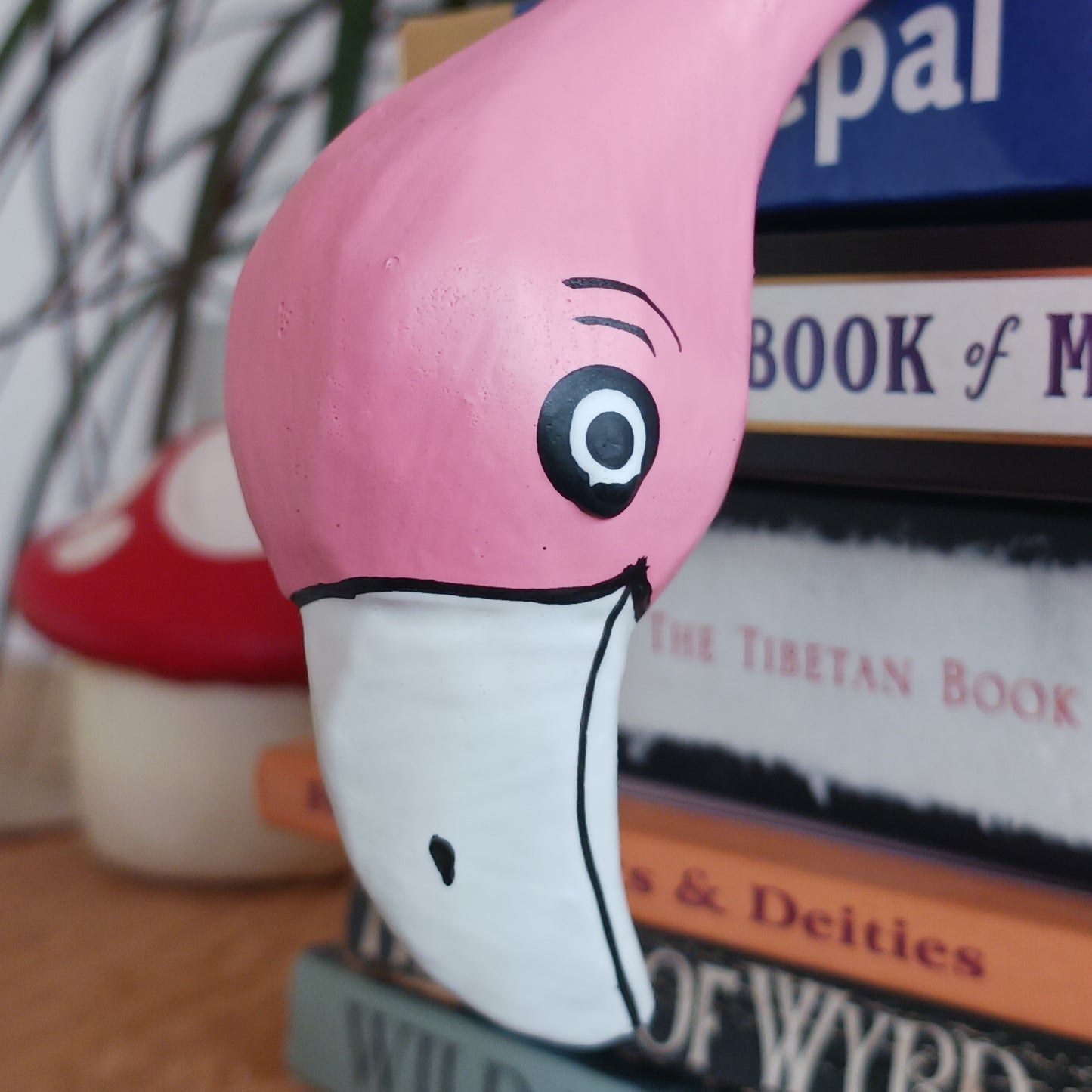Exhibit this delightful handpainted flamingo on a shelf or your desk for a very bright and colourful display. Made using Albesia wood which is fast growing and sustainable.