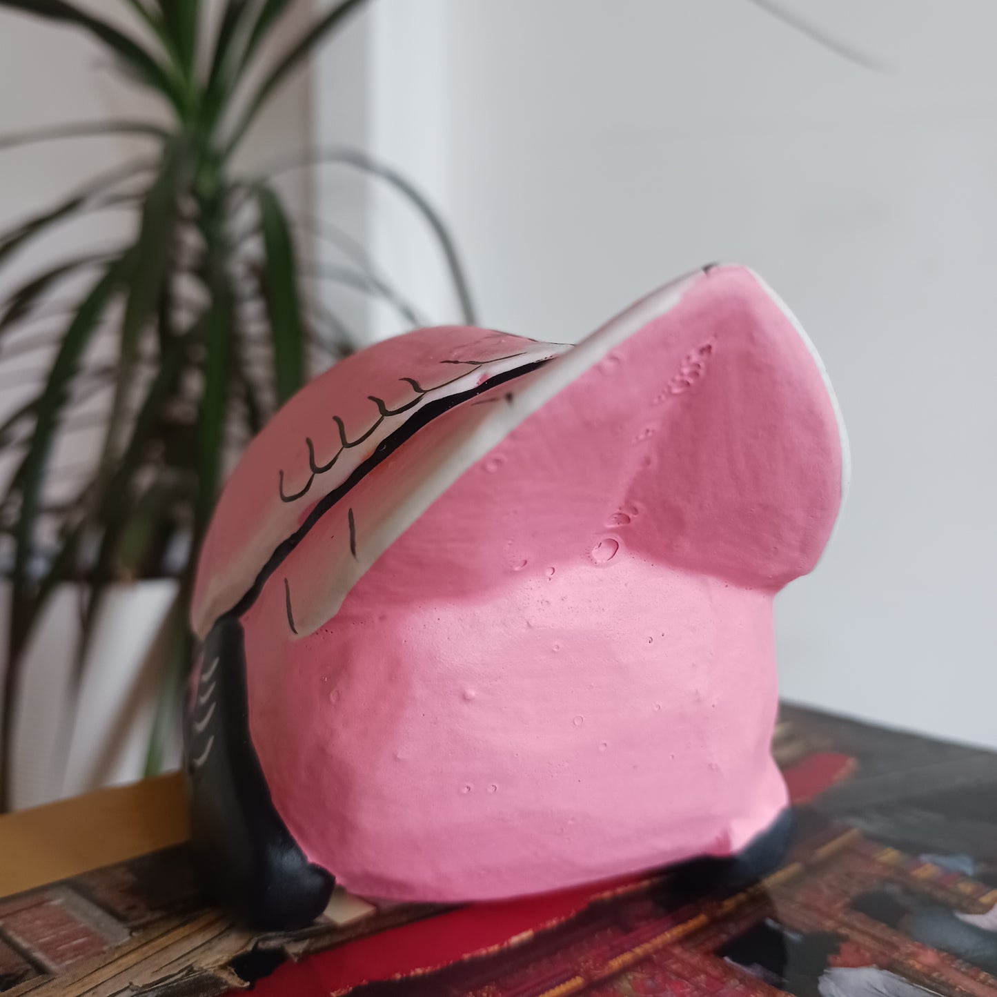 Exhibit this delightful handpainted flamingo on a shelf or your desk for a very bright and colourful display. Made using Albesia wood which is fast growing and sustainable.