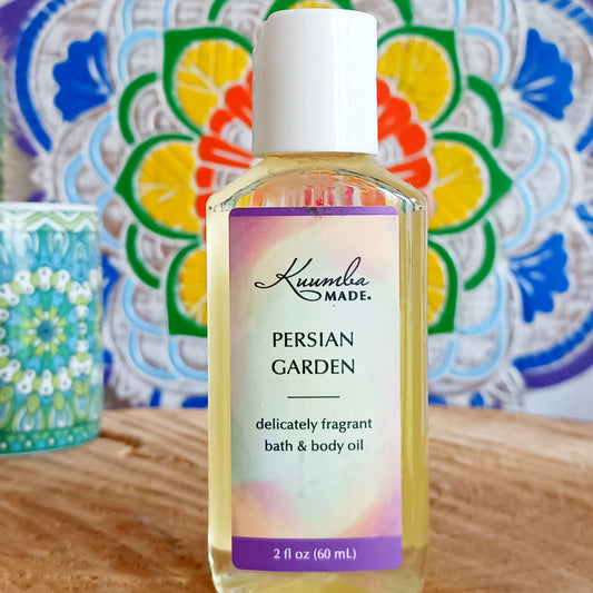 Grounded, smooth, very light and clean with a hint of mystery. A garden of earthly delights, this fast absorbing Persian Garden versatile Bath and Body Oil is packed with moisturizing agents that leave skin and hair radiant, healthy and softly aromatic. Use for daily moisturizing, a lavish massage, a nourishing bath, and as a deep conditioning hair treatment. Made with organic ingredients.