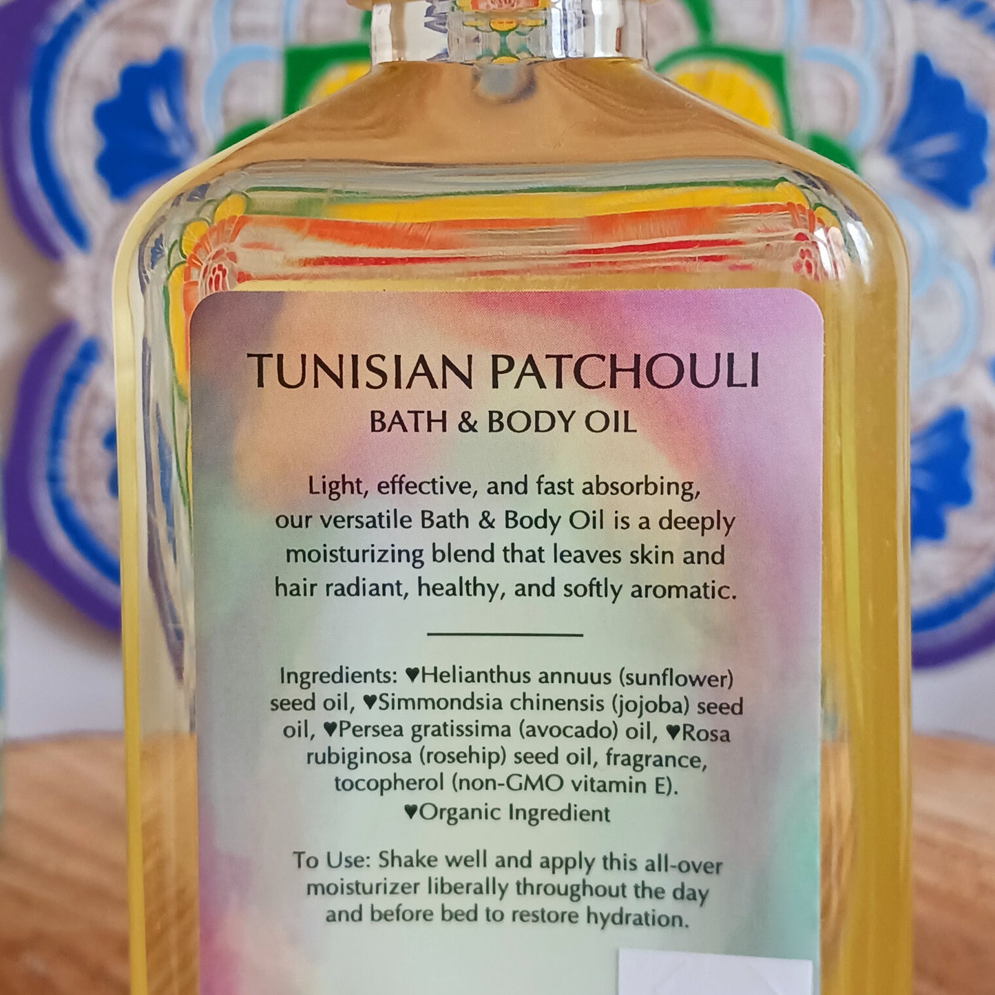 A unique, rich, slightly sweet and well balanced patchouli. Warms the heart, grounds the senses, this fast absorbing Tunisian Patchouli versatile Bath and Body Oil is packed with moisturizing agents that leave skin and hair radiant, healthy and softly aromatic. Use for daily moisturizing, a lavish massage, a nourishing bath, and as a deep conditioning hair treatment. Made with organic ingredients.