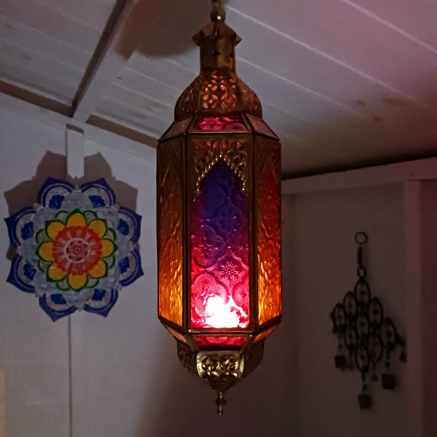 These stunning Moroccan style hanging tealight lanterns feature a rich combination of embossed coloured glass against intricate metal crafted design. Add a warming touch to evenings and enjoy the soothing ambience of natural light against lustrous colour. Super for entertaining inside or out, this gorgeous creation is sure to be a conversation piece!
