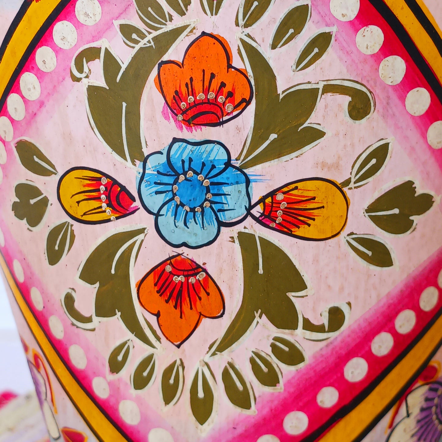Hand painted in a pink floral design, a vintage style iron plant pot to display as a decorative indoor/outdoor planter.
Lovingly hand painted by skilled artisans on a fair trade basis in the Indian desert city of Jodhpur. Fill the striking container with a flowering or contrasting potted plant. Grow seasonal bulbs to bring life and inspiration.