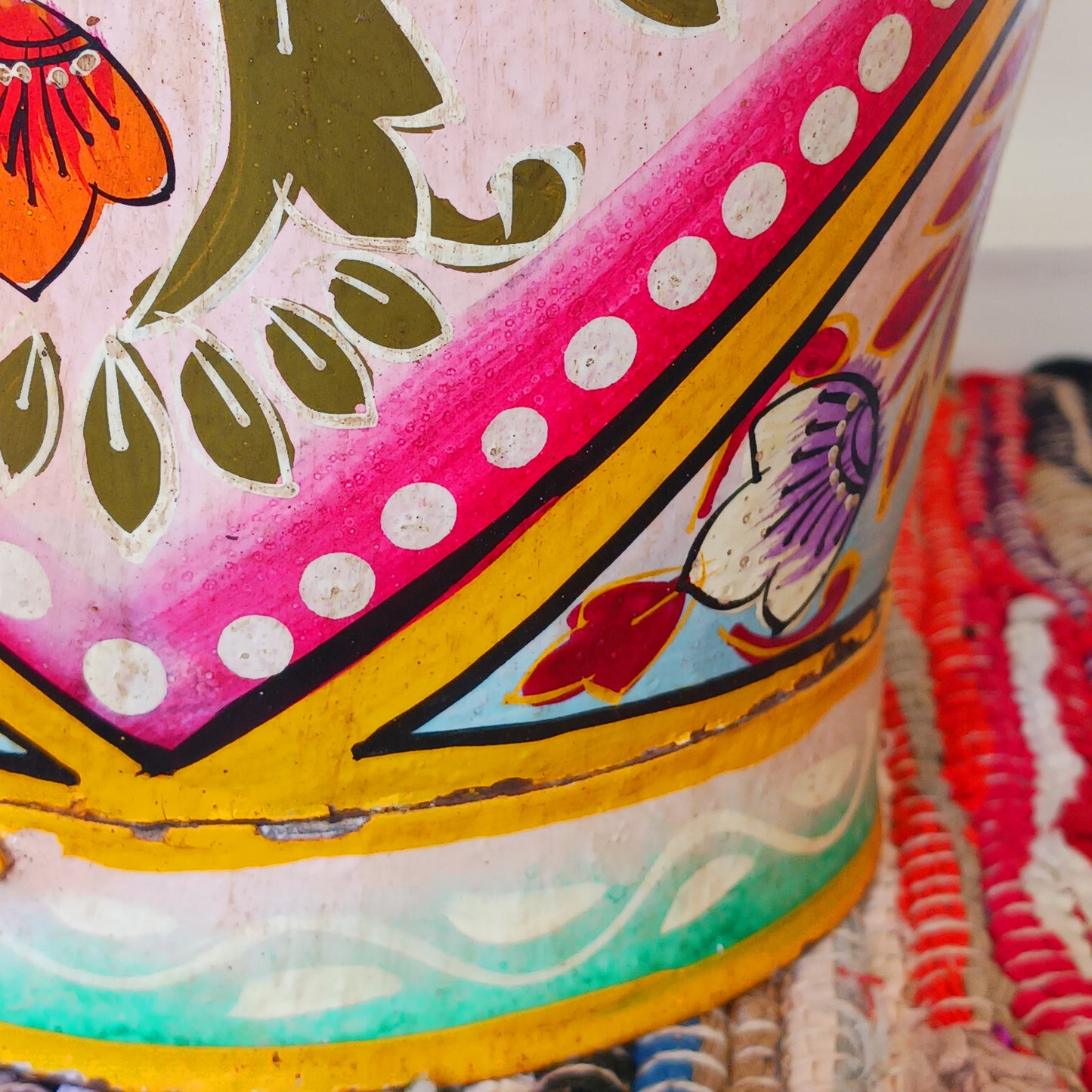 Hand painted in a pink floral design, a vintage style iron plant pot to display as a decorative indoor/outdoor planter.
Lovingly hand painted by skilled artisans on a fair trade basis in the Indian desert city of Jodhpur. Fill the striking container with a flowering or contrasting potted plant. Grow seasonal bulbs to bring life and inspiration.