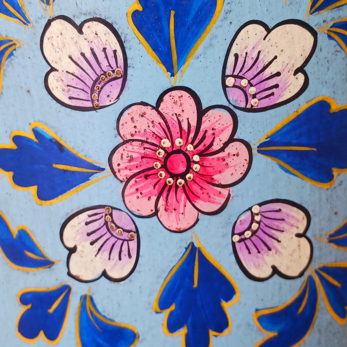 Hand painted in a blue floral design, a vintage style iron plant pot to display as a decorative indoor/outdoor planter.
Lovingly hand painted by skilled artisans on a fair trade basis in the Indian desert city of Jodhpur. Fill the striking container with a flowering or contrasting potted plant. Grow seasonal bulbs to bring life and inspiration.