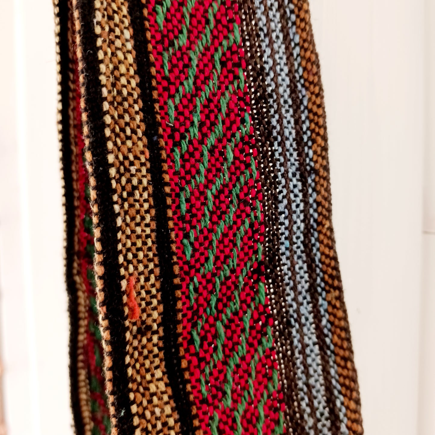 This handy little shoulder bag has a wide strap that is long enough to use as a shoulder or crossbody bag and also makes it comfortable to wear for long periods. The main fabric is traditional with a beautiful embroidered decorated elephants on the front. The bag is finished with tassels.