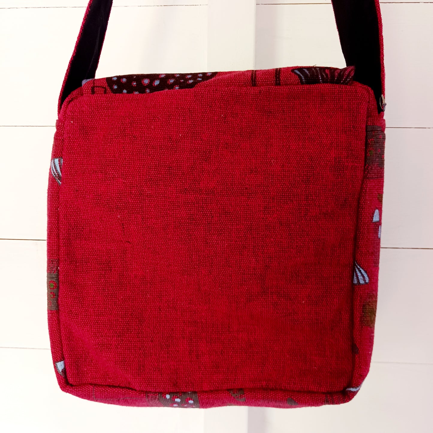This lovely Yin Yang shoulder bag is both practical and unusual. There are three zipped compartments ensuring you keep your valuables safe. The Yin Yang design on the front is set in a colourful mandala on the flap, and this is secured with a velcro strips. The staps are adjustable to suit your style.