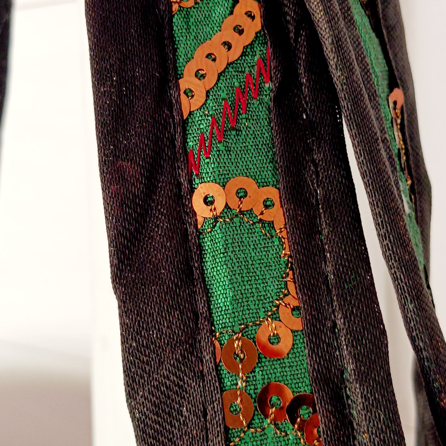 This beautiful large Indian bag comes with a wide shoulder strap and plenty of space inside for your personal items. In a patchwork style design, this bag is intricately embroidered with a traditional bohemian pattern. The bag is fully lined throughout.