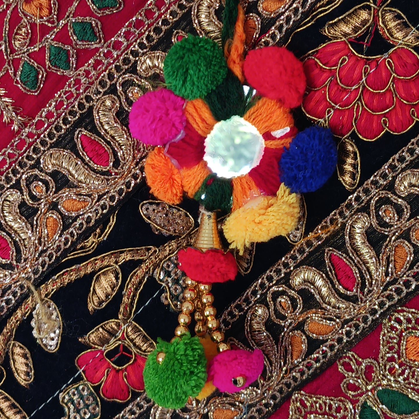 This beautiful large Indian bag comes with a wide shoulder strap and plenty of space inside for your personal items. In a patchwork style design, this bag is intricately embroidered with a traditional bohemian pattern. The bag is fully lined throughout.
