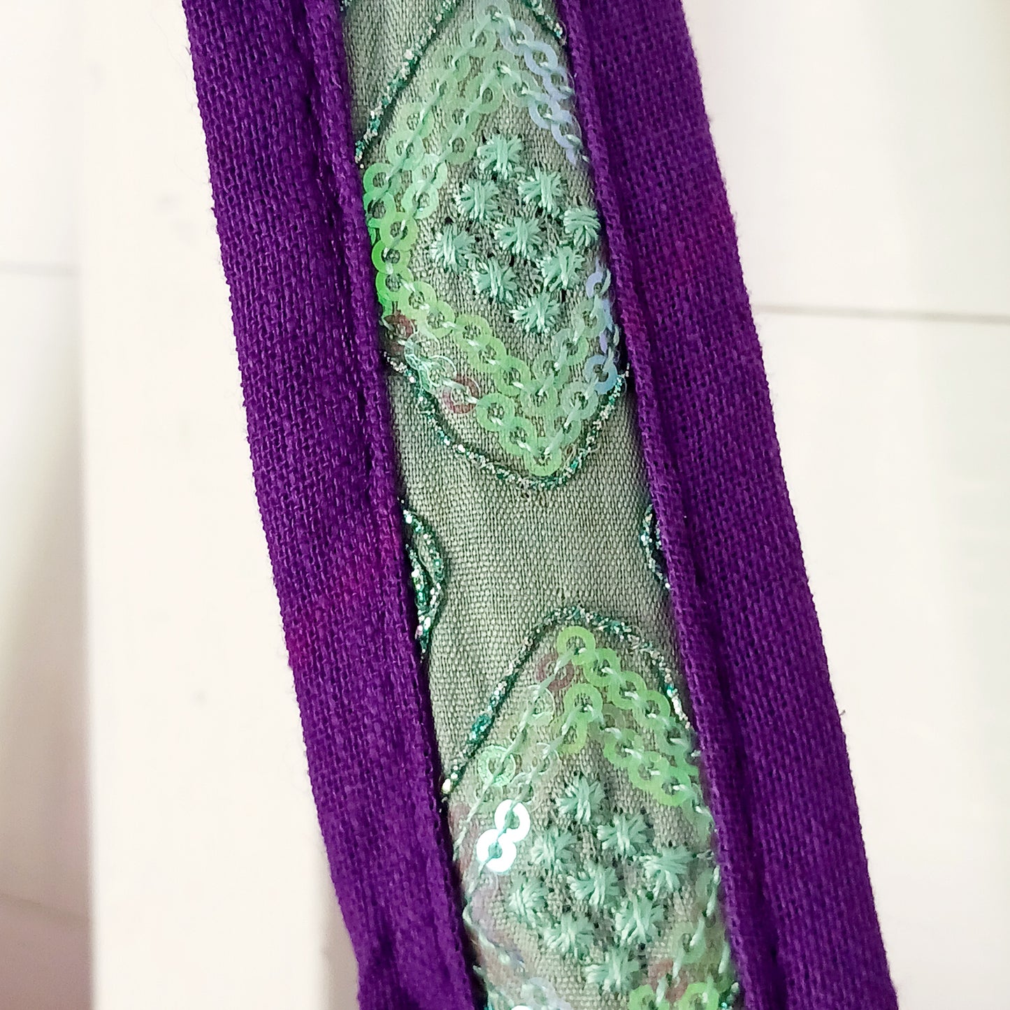 This beautiful large Indian bag comes with a wide shoulder strap and plenty of space inside for your personal items. In a patchwork style design, this bag is intricately embroidered with a traditional bohemian pattern. The bag is fully lined throughout.