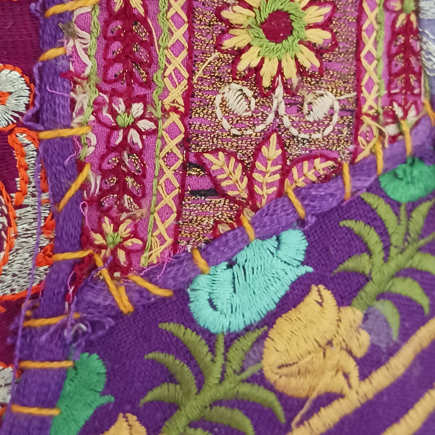 This beautiful large Indian bag comes with a wide shoulder strap and plenty of space inside for your personal items. In a patchwork style design, this bag is intricately embroidered with a traditional bohemian pattern. The bag is fully lined throughout.