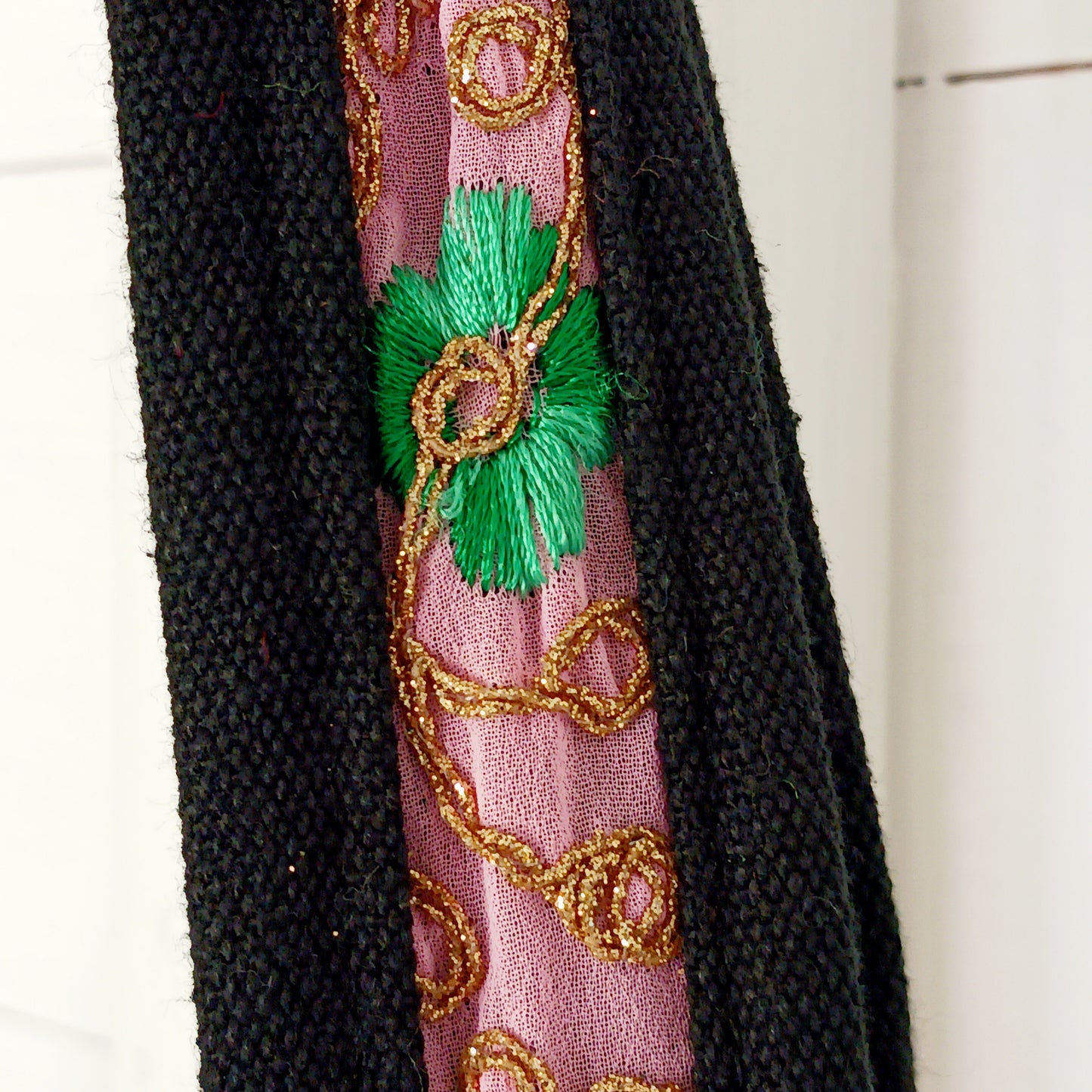 This beautiful large Indian tote bag comes with a wide shoulder strap and plenty of space inside for your personal items. In a patchwork style design, this bag is intricately embroidered with a traditional bohemian pattern. The bag comes decorated with beads and pom poms and is fully lined throughout.