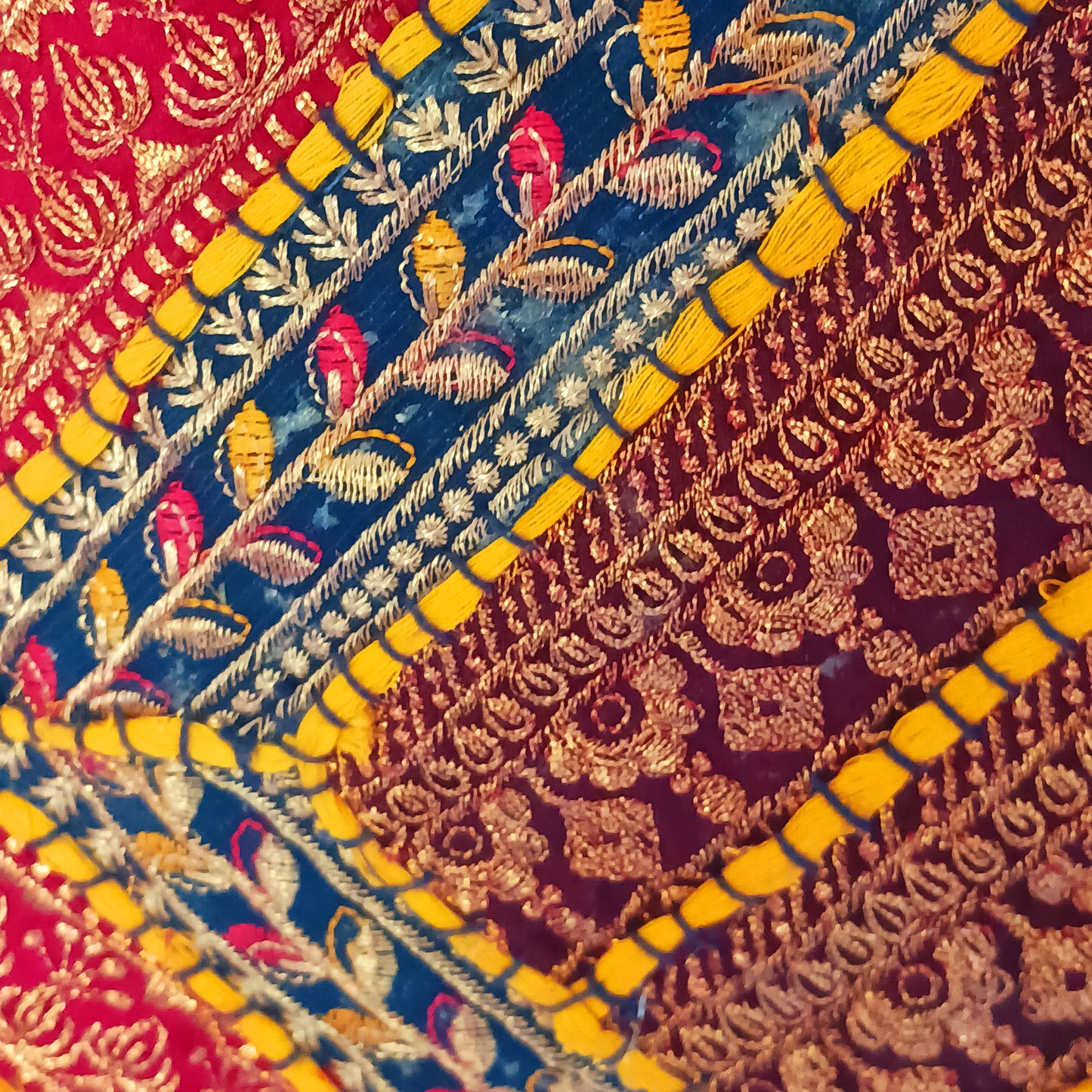 This beautiful large Indian tote bag comes with a wide shoulder strap and plenty of space inside for your personal items. In a patchwork style design, this bag is intricately embroidered with a traditional bohemian pattern.The bag comes decorated with beads and pom poms and is fully lined throughout.